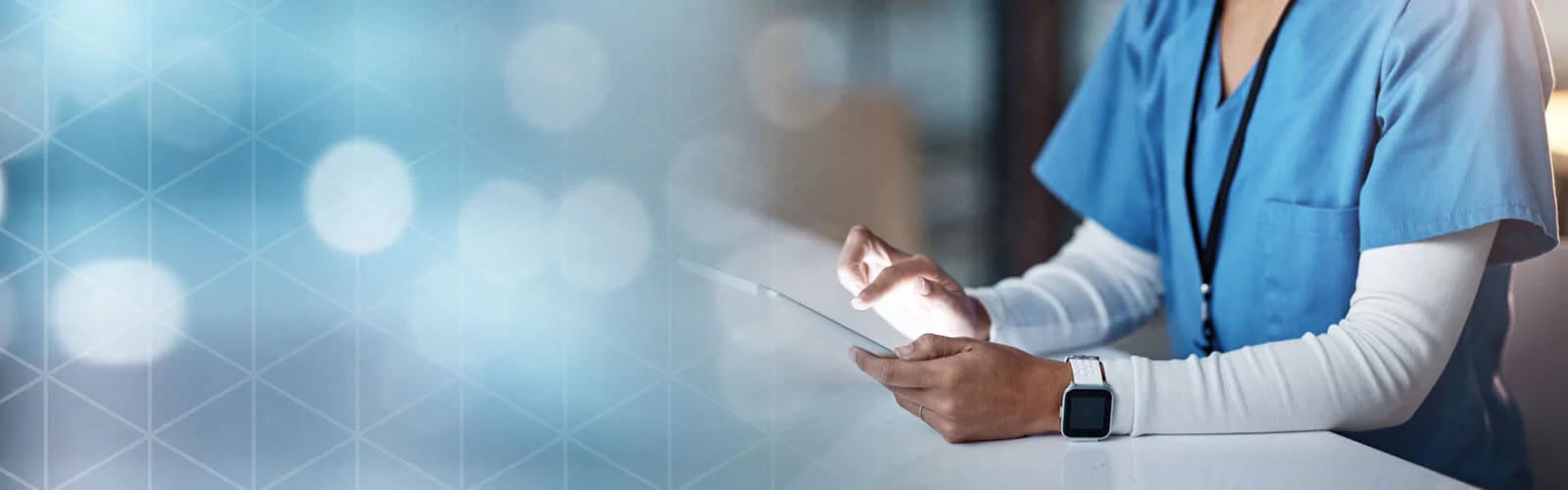 Medical professional using a tablet