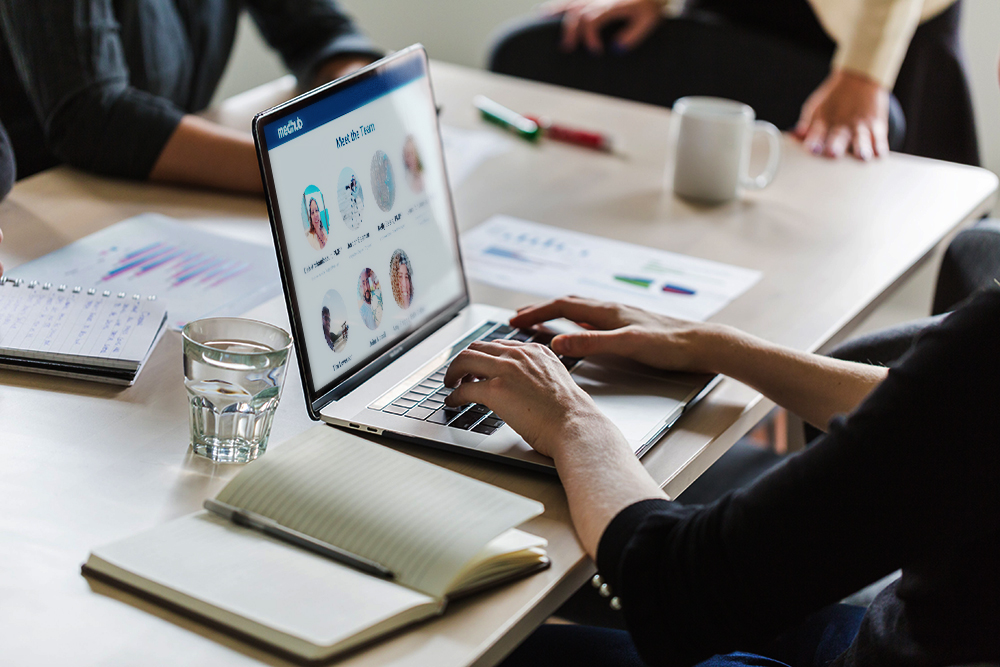 Person viewing MedHub FAQ on a tablet