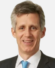 photo of Christoph Kurth smiling with dark glasses