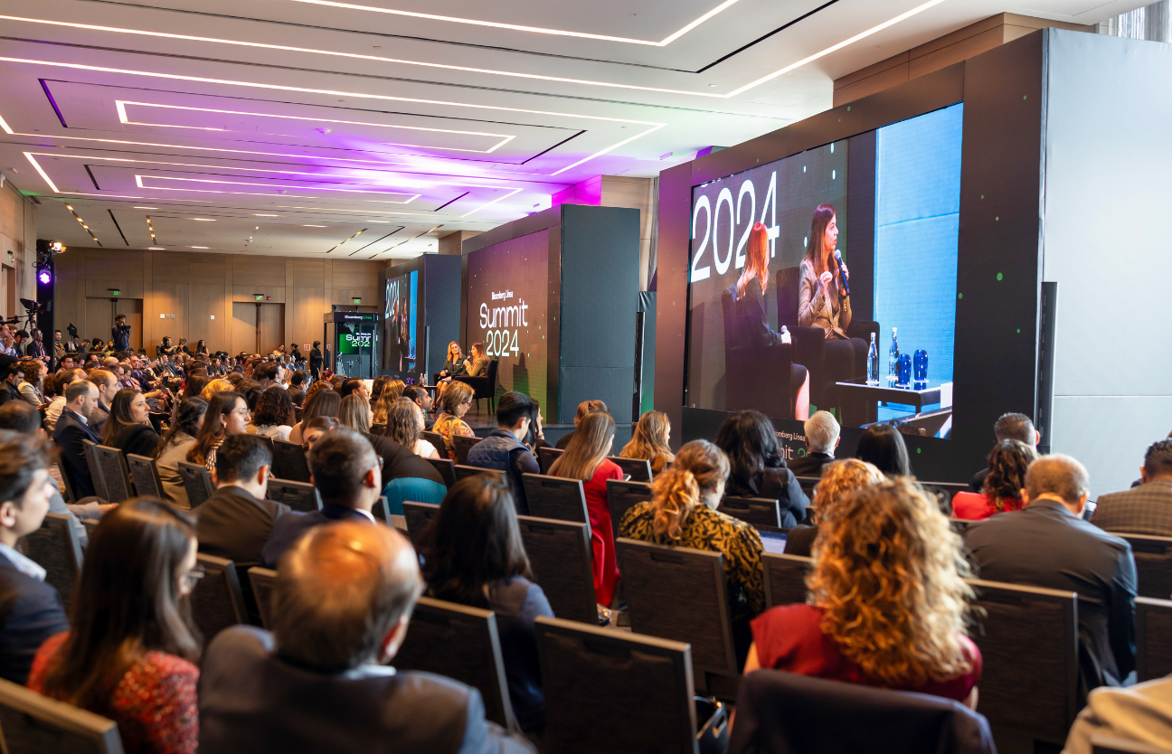 Stage: Startup CEO and Hardware Engineer Present New Product. Speakers Lead Lecture on Business, Science, Technology, Entrepreneurship, Health, Ecology, Development, Leadership and all Things Digital