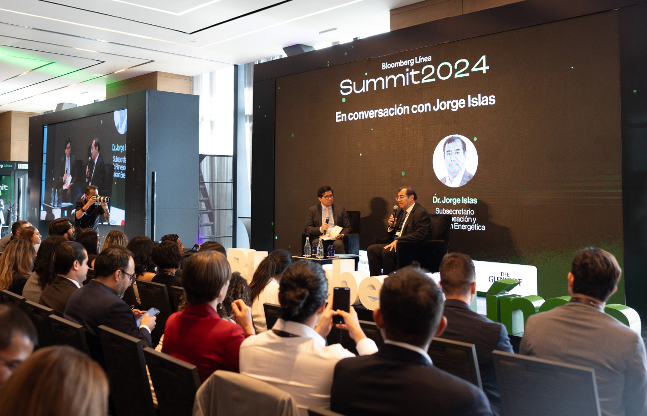 Stage: Startup CEO and Hardware Engineer Present New Product. Speakers Lead Lecture on Business, Science, Technology, Entrepreneurship, Health, Ecology, Development, Leadership and all Things Digital