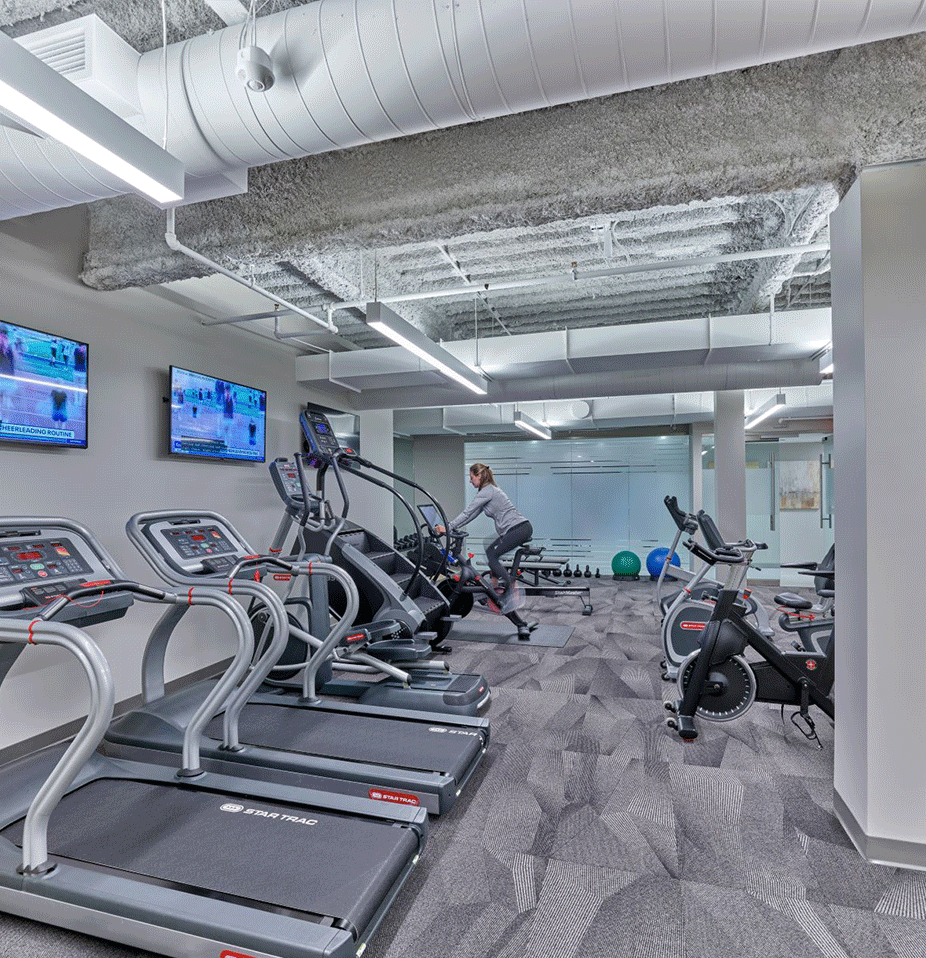 Happy young interracial couple shake hand of bank manager broker buy insurance services take mortgage loan, mixed ethnicity customers handshake agent make agreement financial business deal at meeting