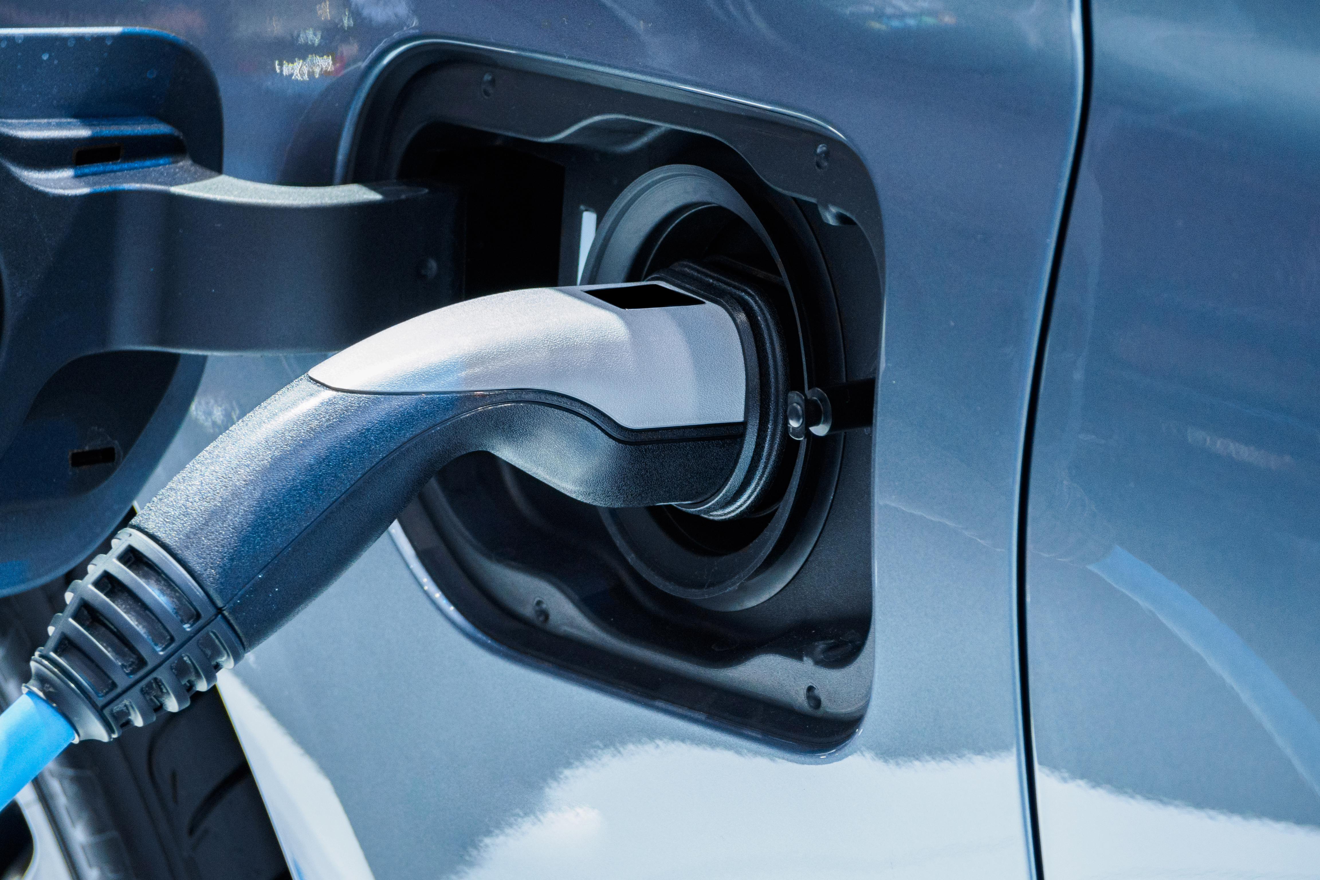 Electric vehicle charging station for home with EV car.