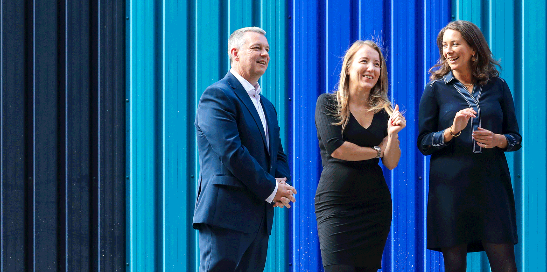 A gif of Carter Jonas' BTR team stood outside of Wimbledon Football Stadium