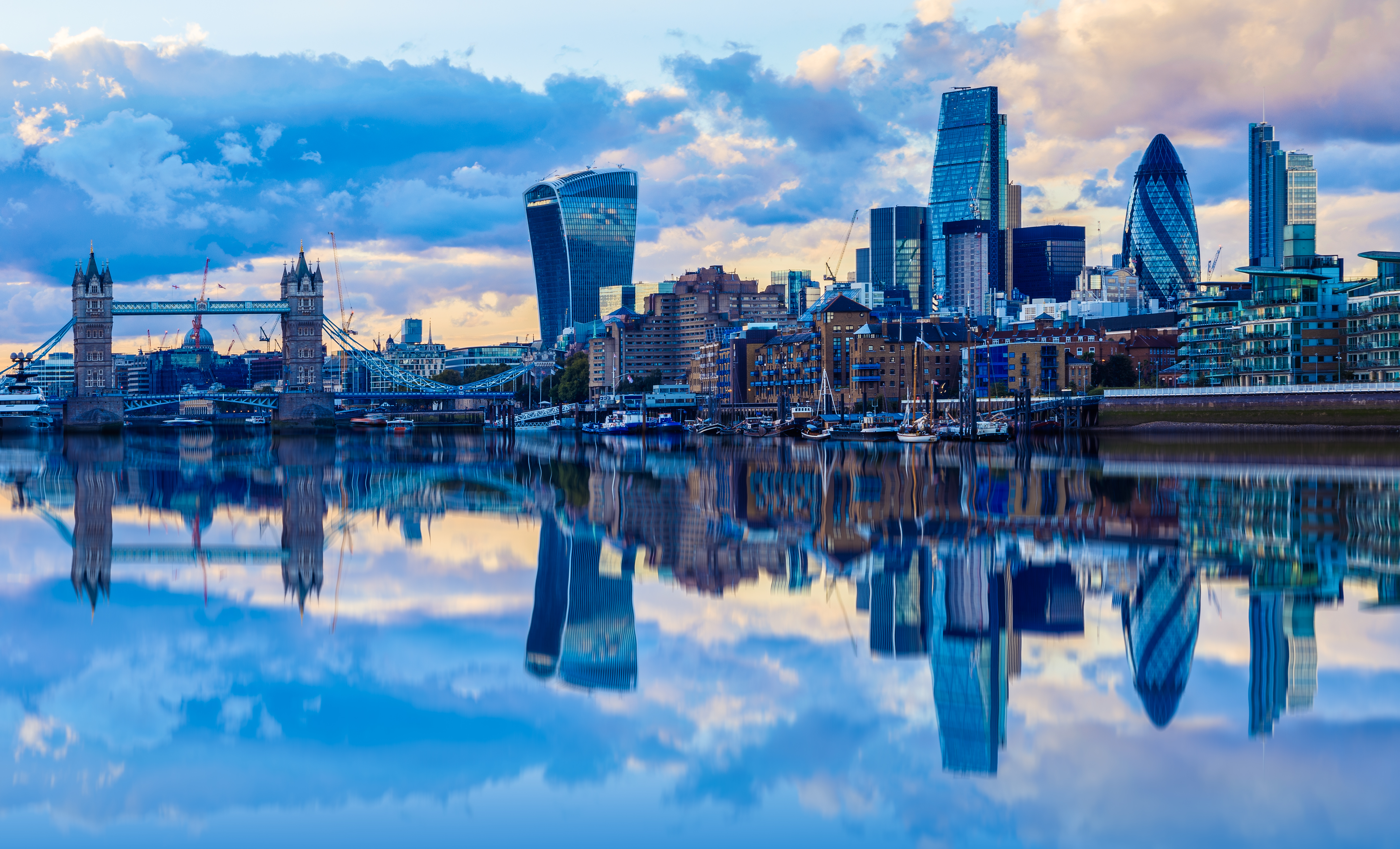 London cityscape and its reflection from river Thames at sunset