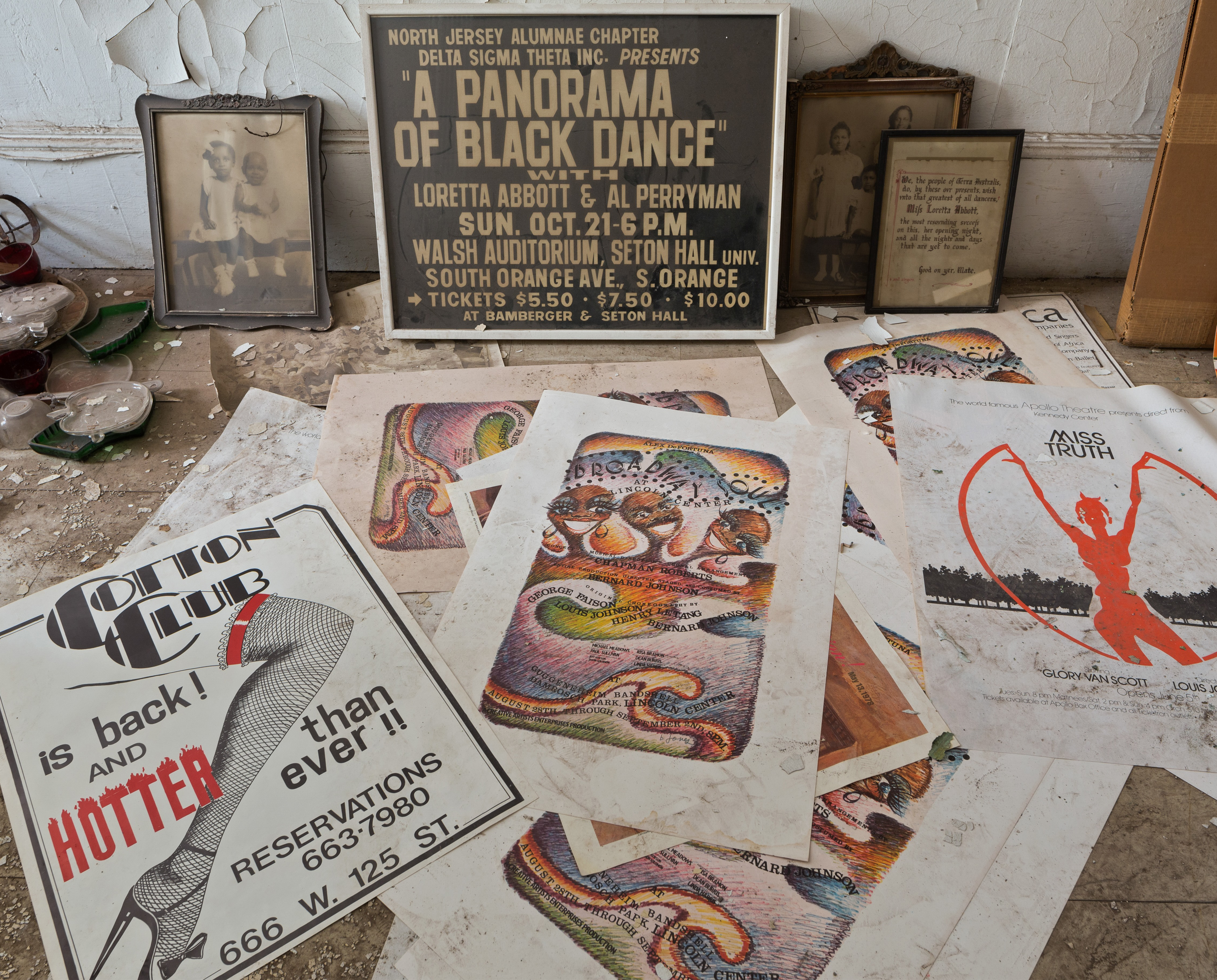 Collection of vintage posters and photographs, including event ads the Cotton Club.