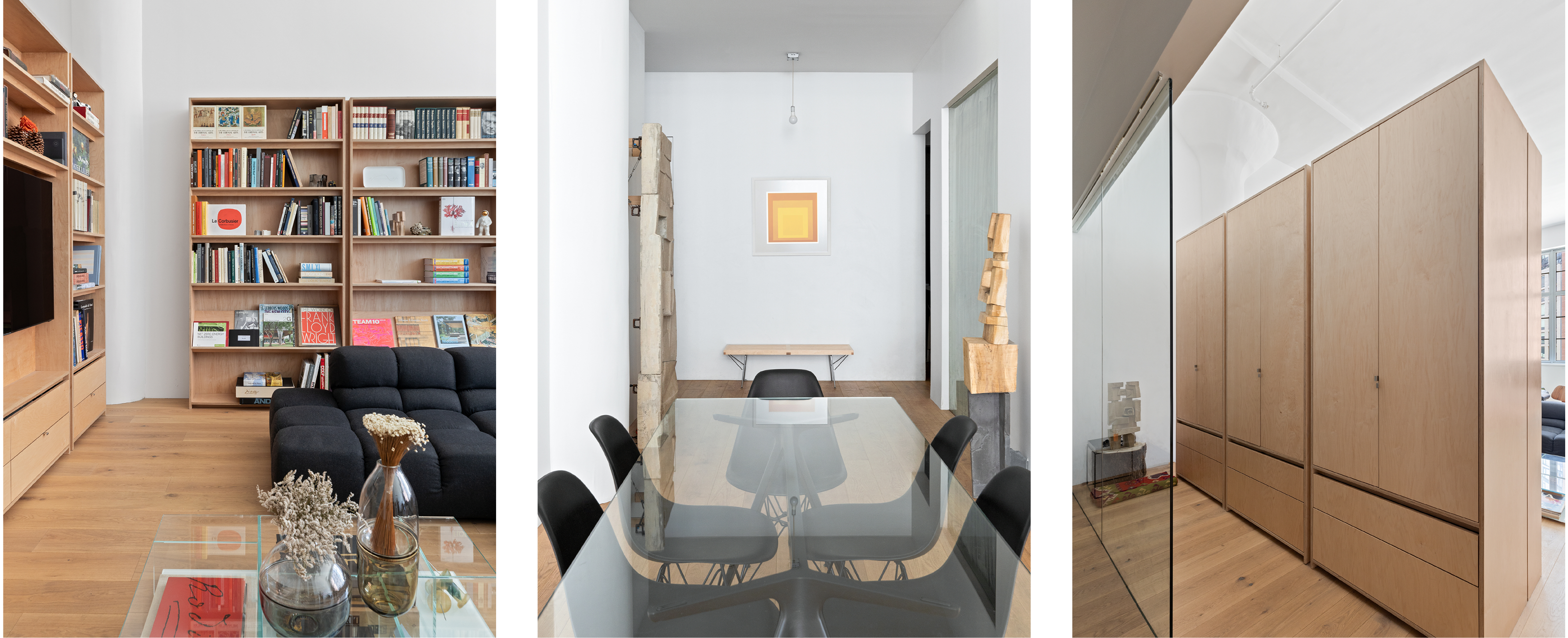 3 photos in a row horizontally: The first photo is of a living room space with a bookshelf, black sofa, television, and glass coffee table ; the second is of a dining room with a long glass table and 5 black chairs ; the third is a row of three light brown wooden cabinets atop a light brown wooden floor.