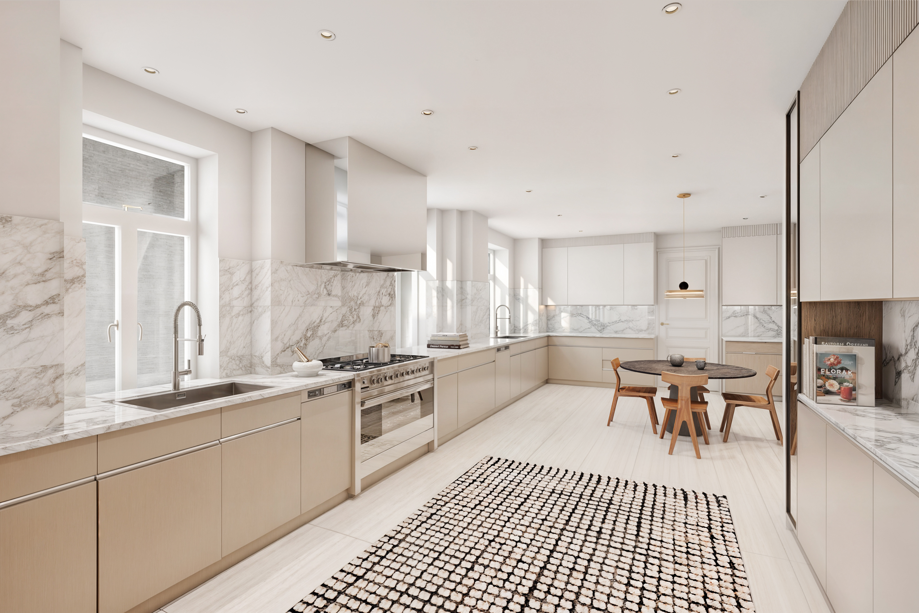 Modern kitchen with beige cabinets, marble countertops and backsplash, stainless steel appliances, a round dining table with four wooden chairs, and a black-and-white patterned rug, with natural light streaming through large windows.