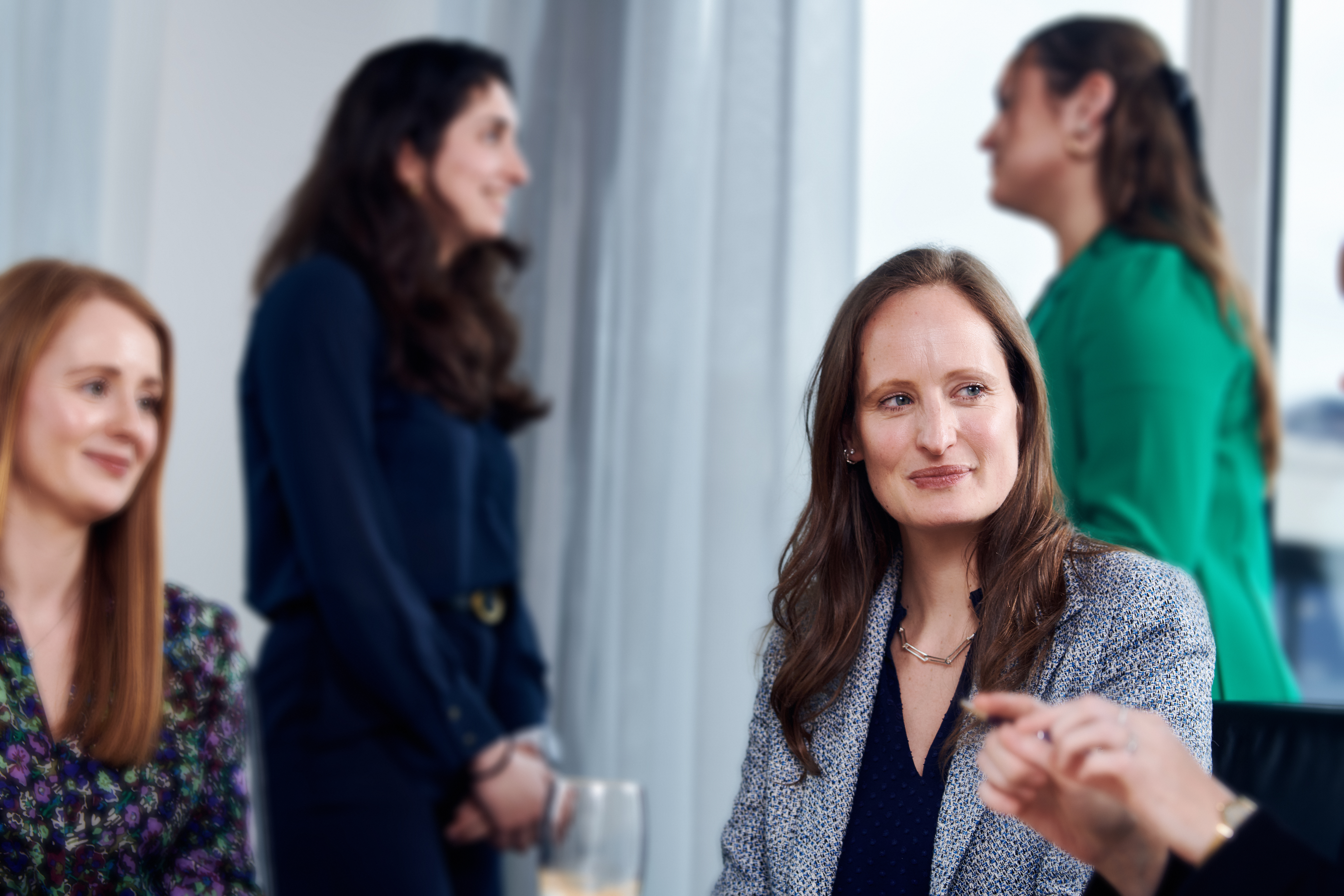 Group of women in an office setting