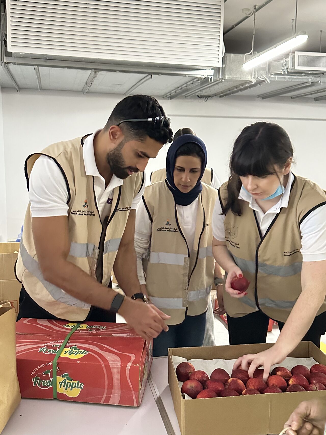 Volunteers proving food at Feed a labour 