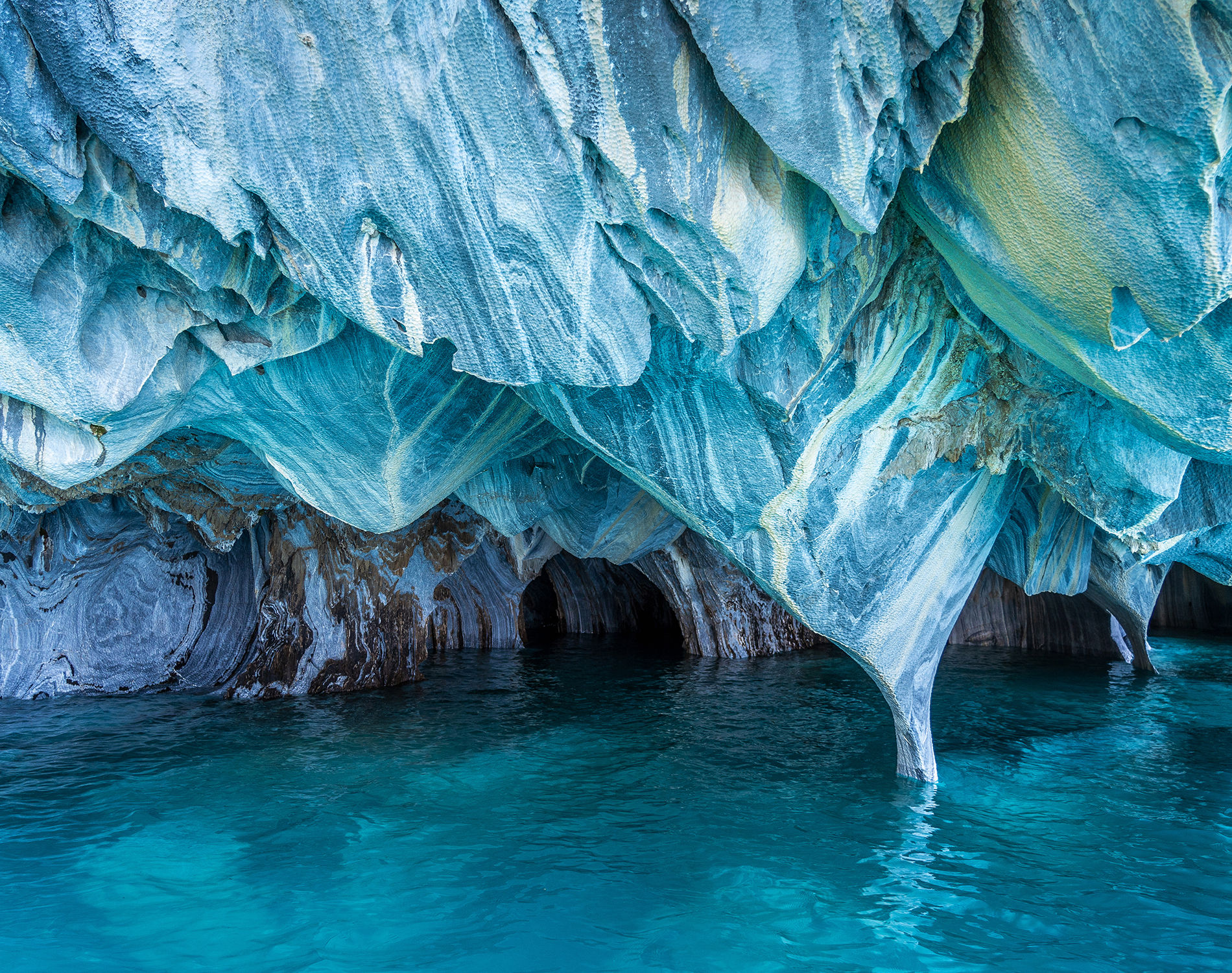 Glacial melt water under a rock formation