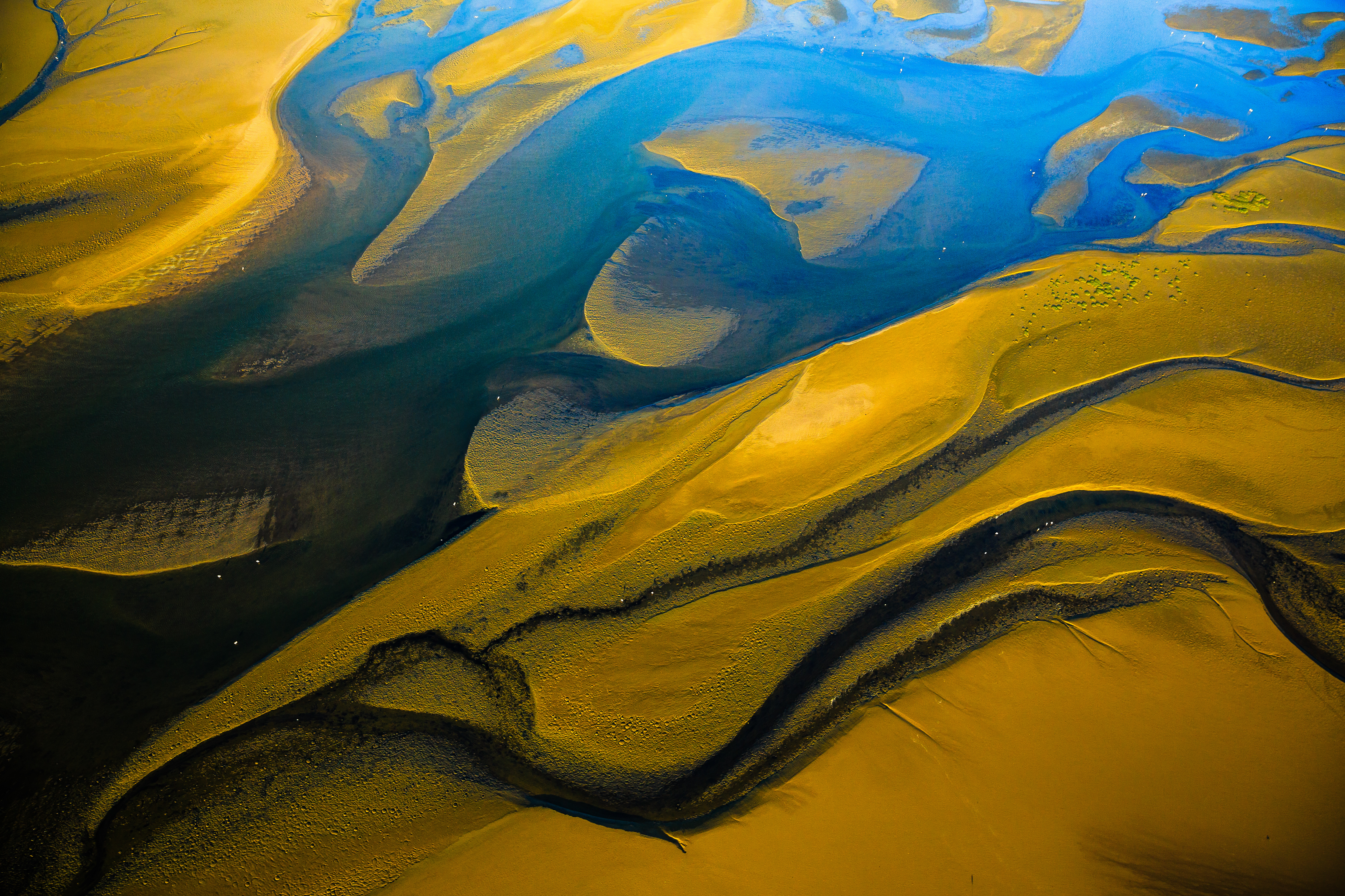 Abstract sand dune with blue and gold colour