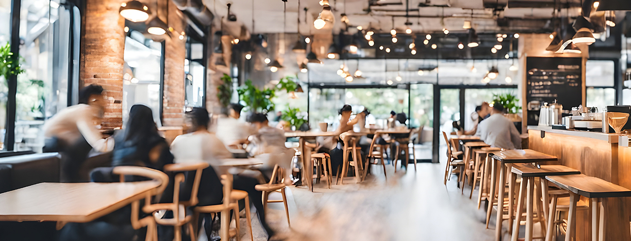 Restaurant with people eating and socializing.