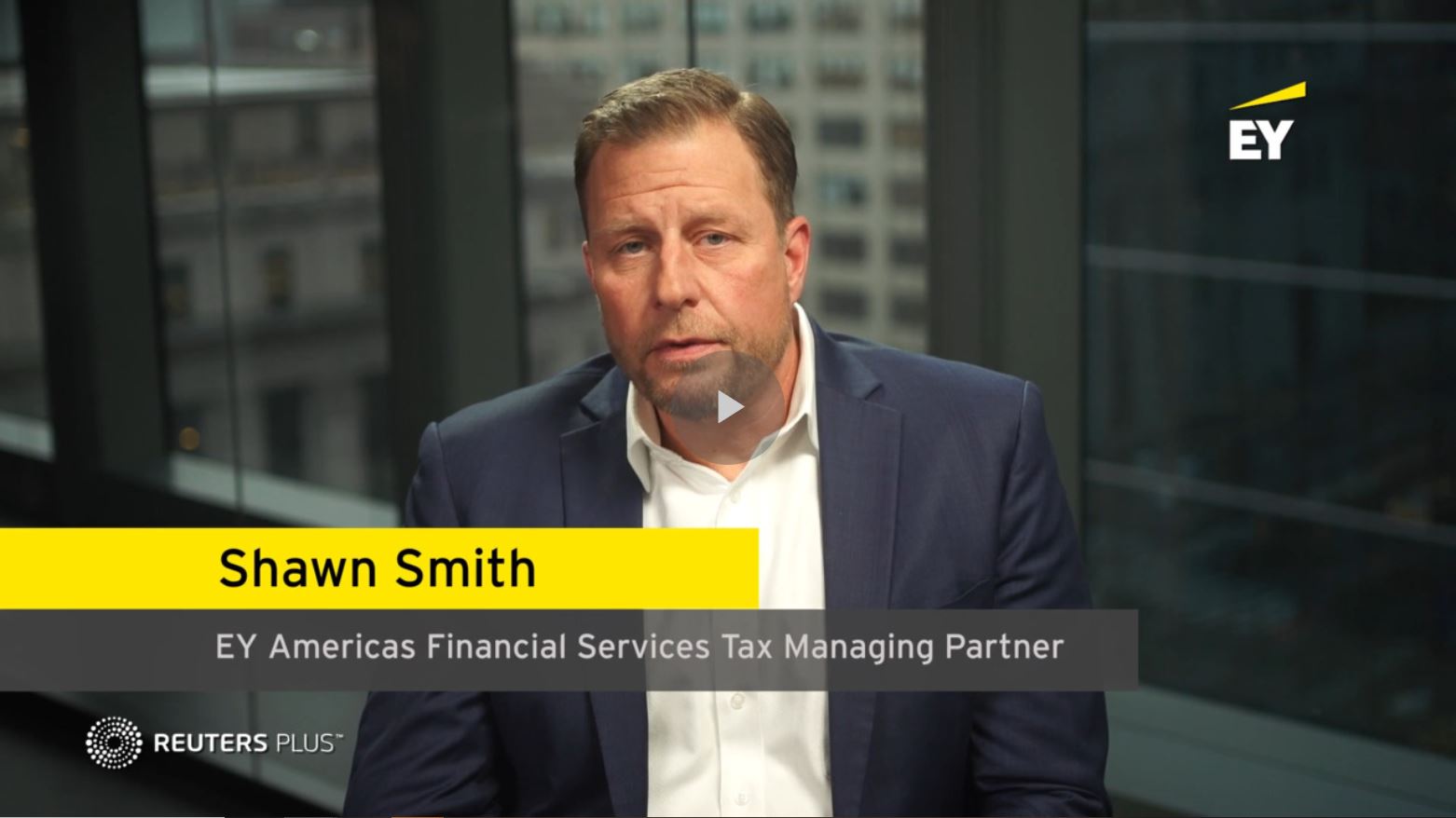 An image of Shawn Smith, EY Americas Financial Services Tax Managing Partner, speaking to the camera