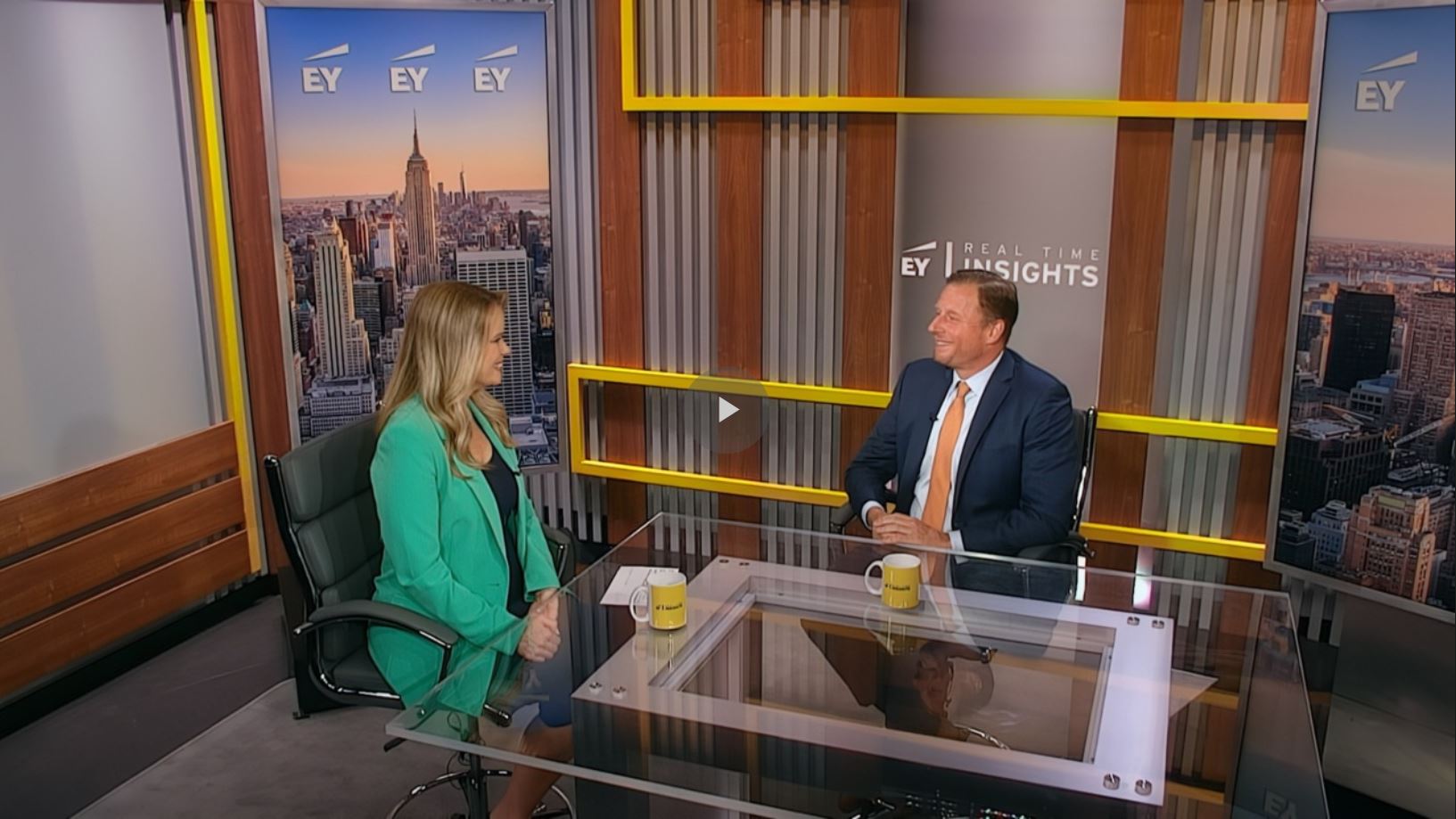 An image of Shawn Smith, EY Americas Financial Services Tax Managing Partner, speaking with EY Real Time Insights host Caroline Woods