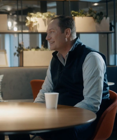 Damian Klute, Ernst & Young LLP Principal for Business Consulting Consumer Venture Building conversing in a conversation at the table