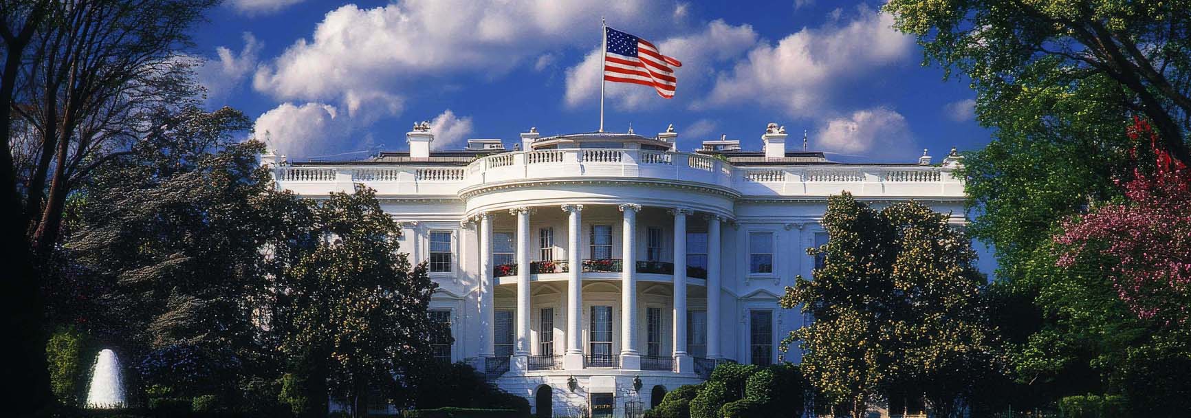 An image of a male voter at the ballot participating in the US election