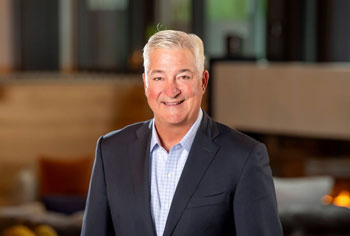 A portrait of John Babitt, EY Global MedTech Leader Ernst & Young LLP