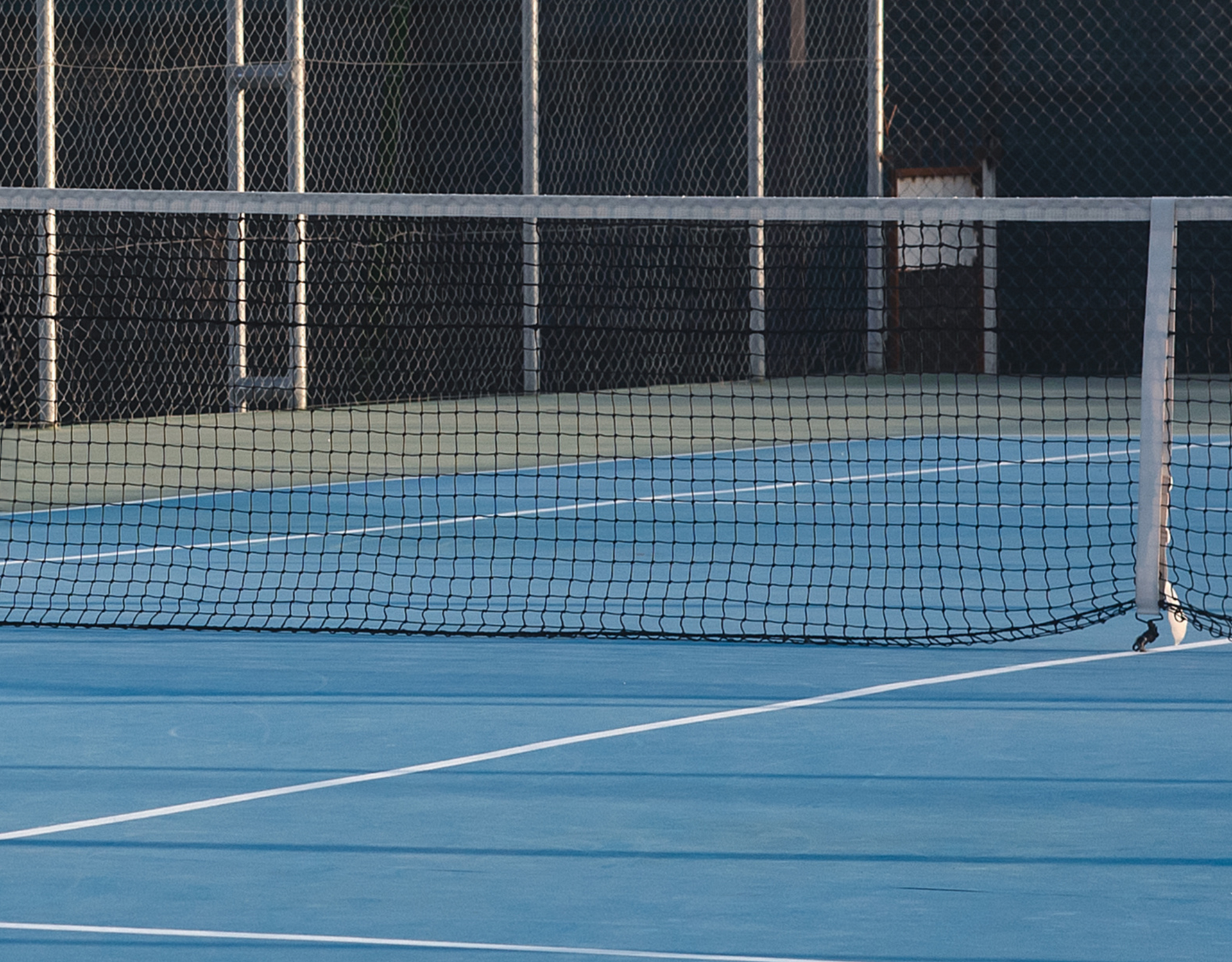 Image of relay racers preparing to begin the race on a track
