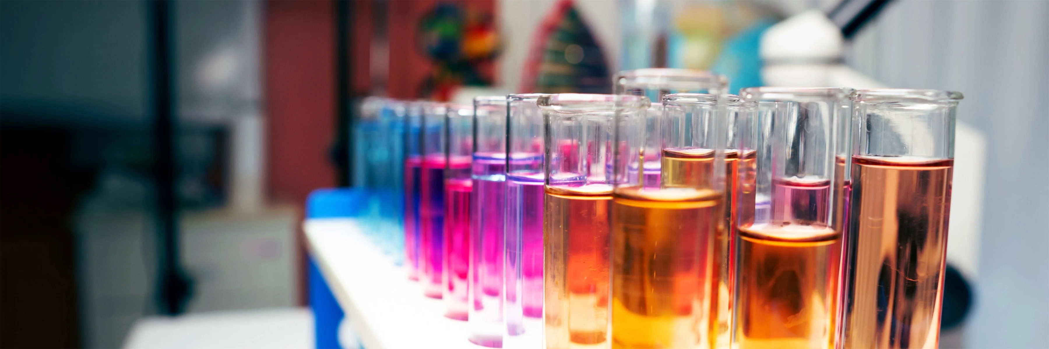 Image of pharma test tubes with various different colors of liquid inside