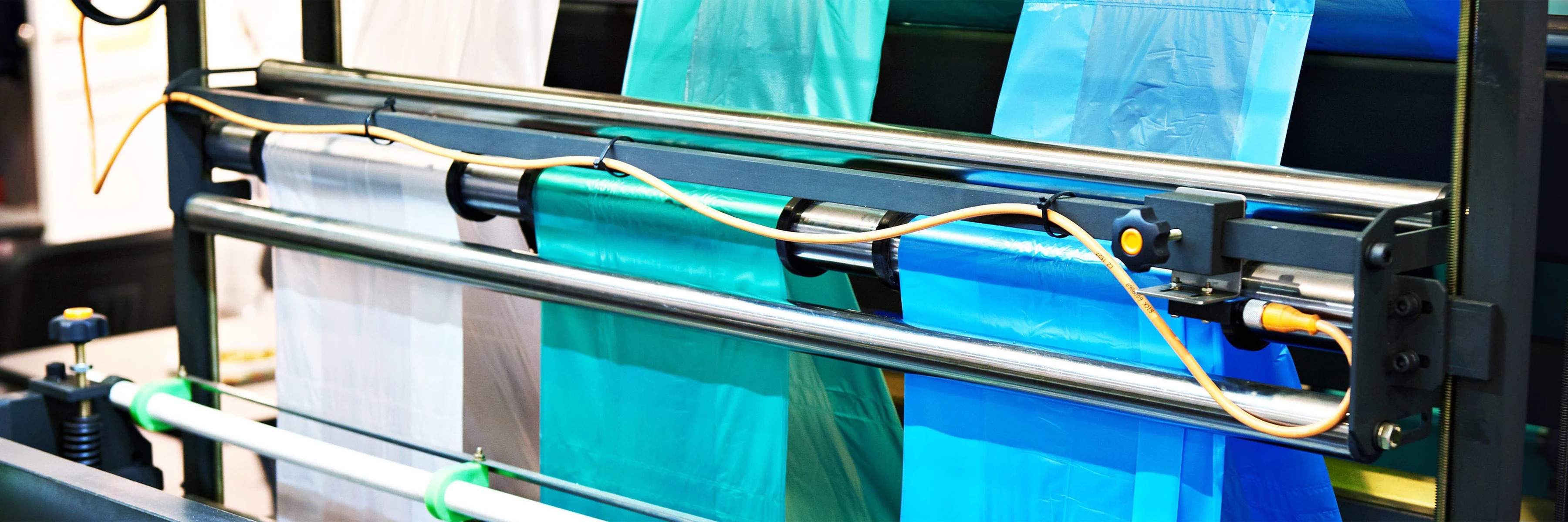 Image of a machine producing plastic bags