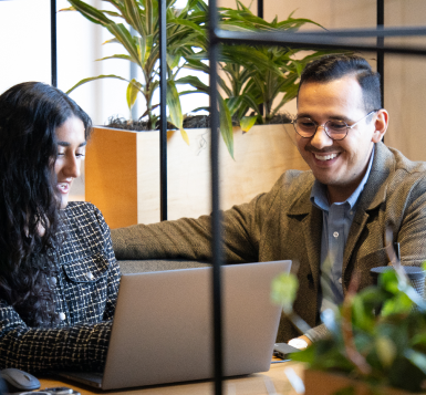 EY Colleagues in open collaboration area working