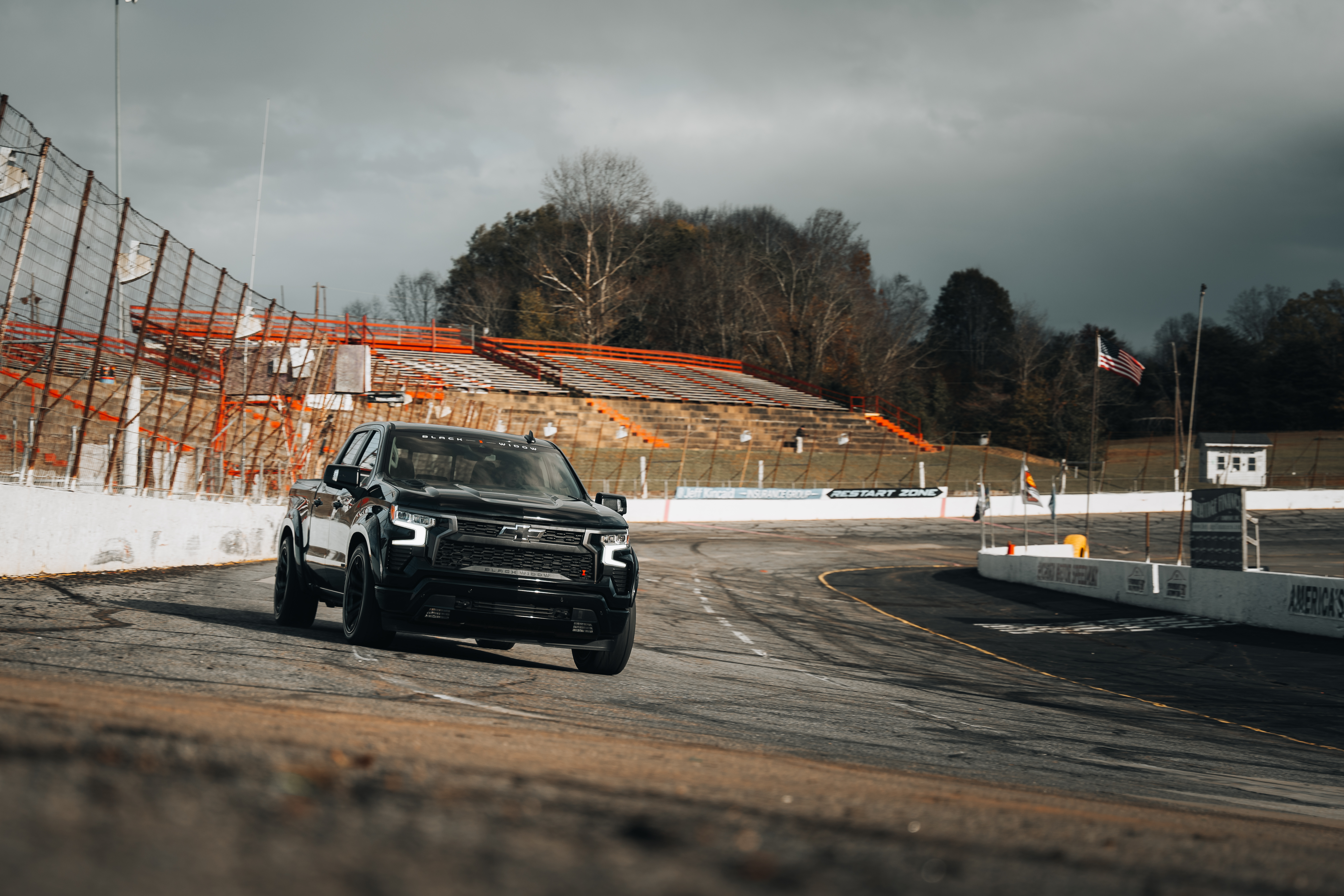 Lowered Chevrolet Silverado at a race track 