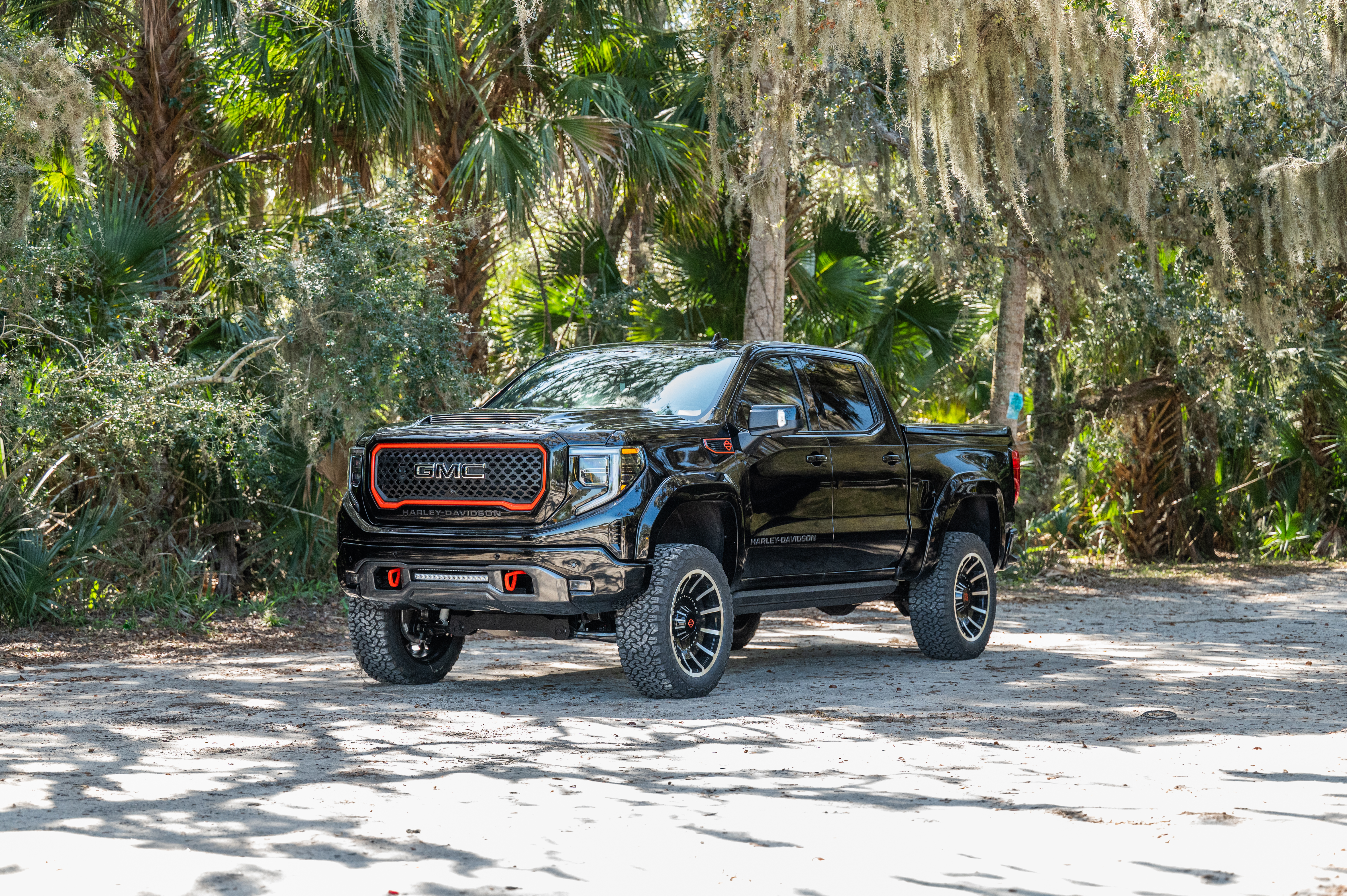 GMC 15OO SIERRA HARLEY DAVIDSON BLACK LIFTED TRUCK WITH ORANGE ACCENTS
