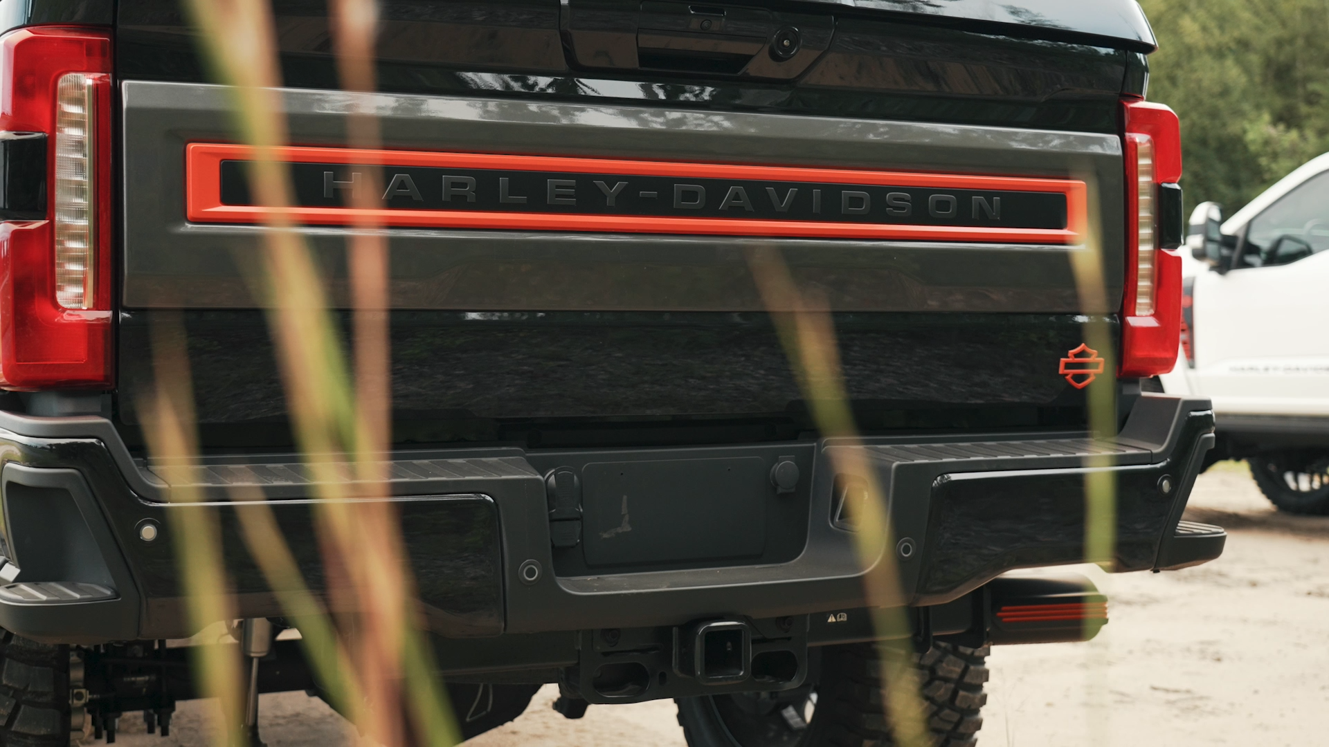 close up view of Harley-Davidson badging on tailgate of a black Harley-Davidson lifted truck