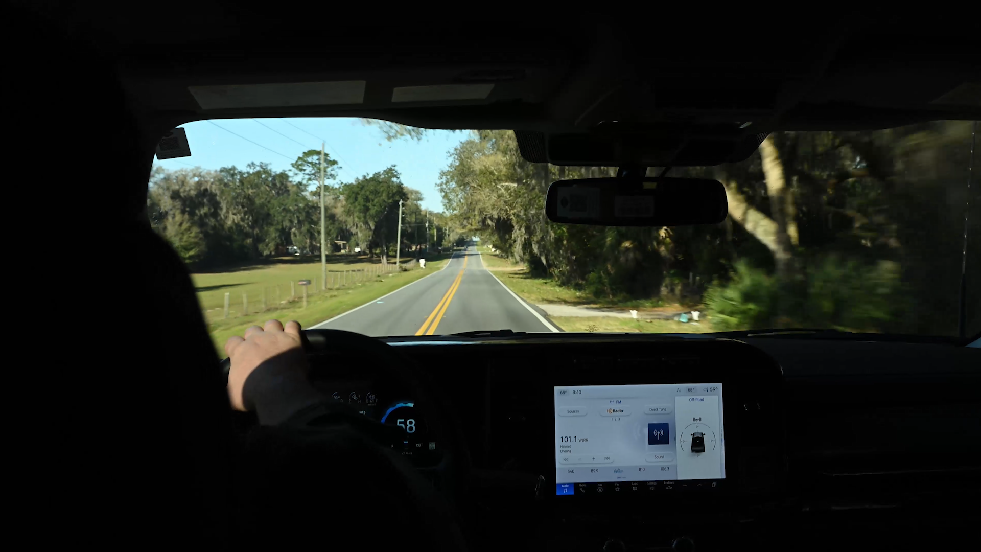 THROUGH THE WINDSHIELD BEHIND THE WHEEL OF HARLEY-DAVIDSON TRUCKS