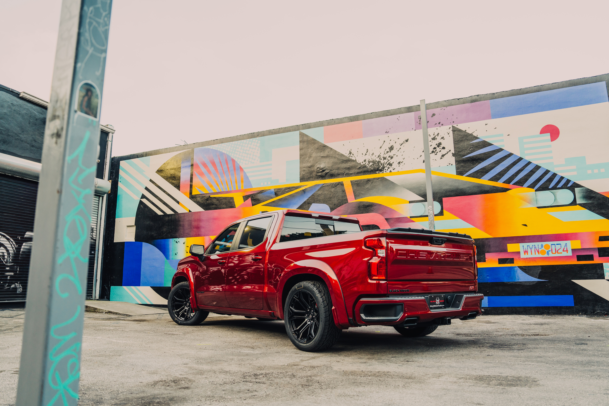 Black Widow SR Silverado lowered parked on road