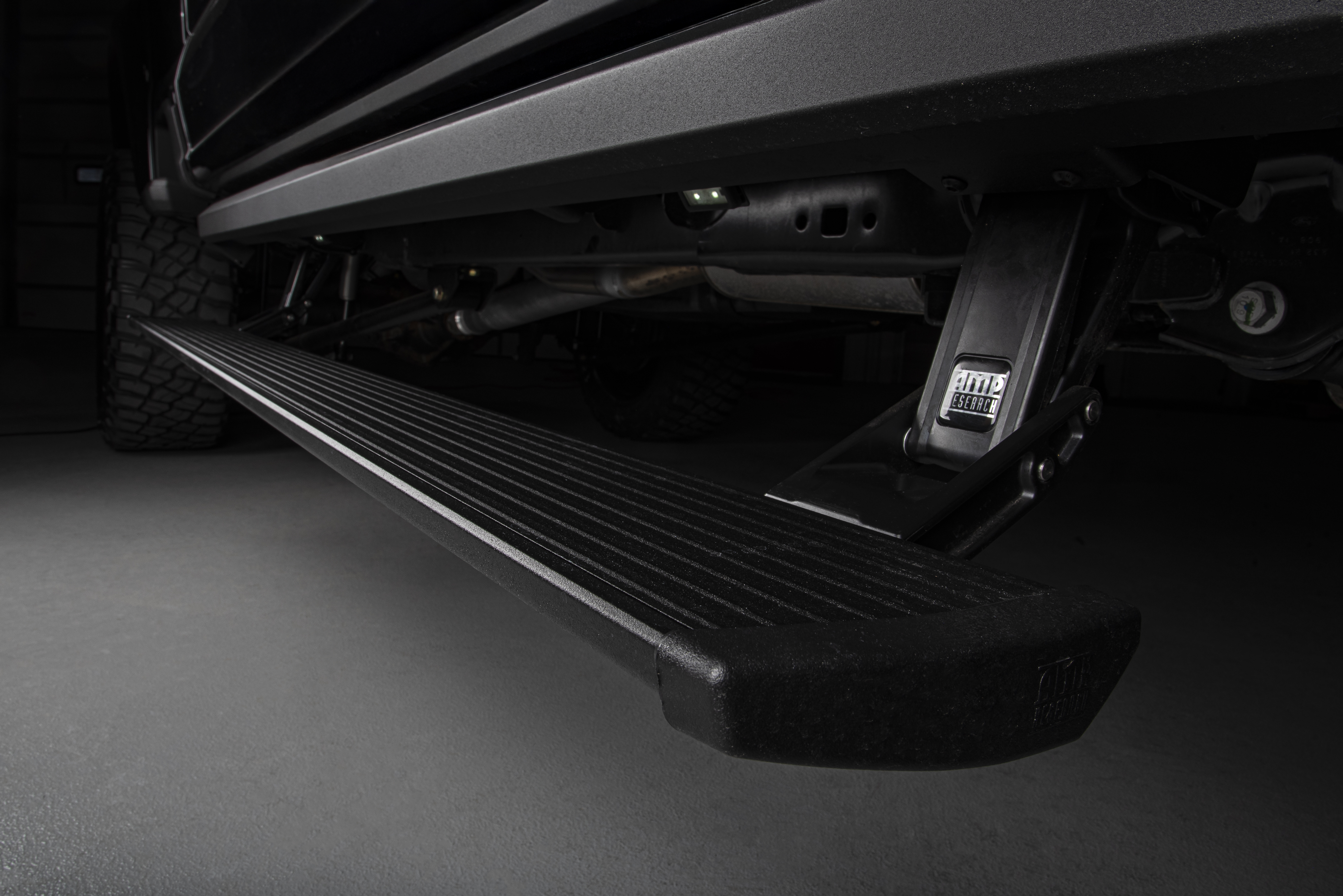 Power Running Boards with Rock Guard Trim and Entry Lights on Harley-Davidson Trucks