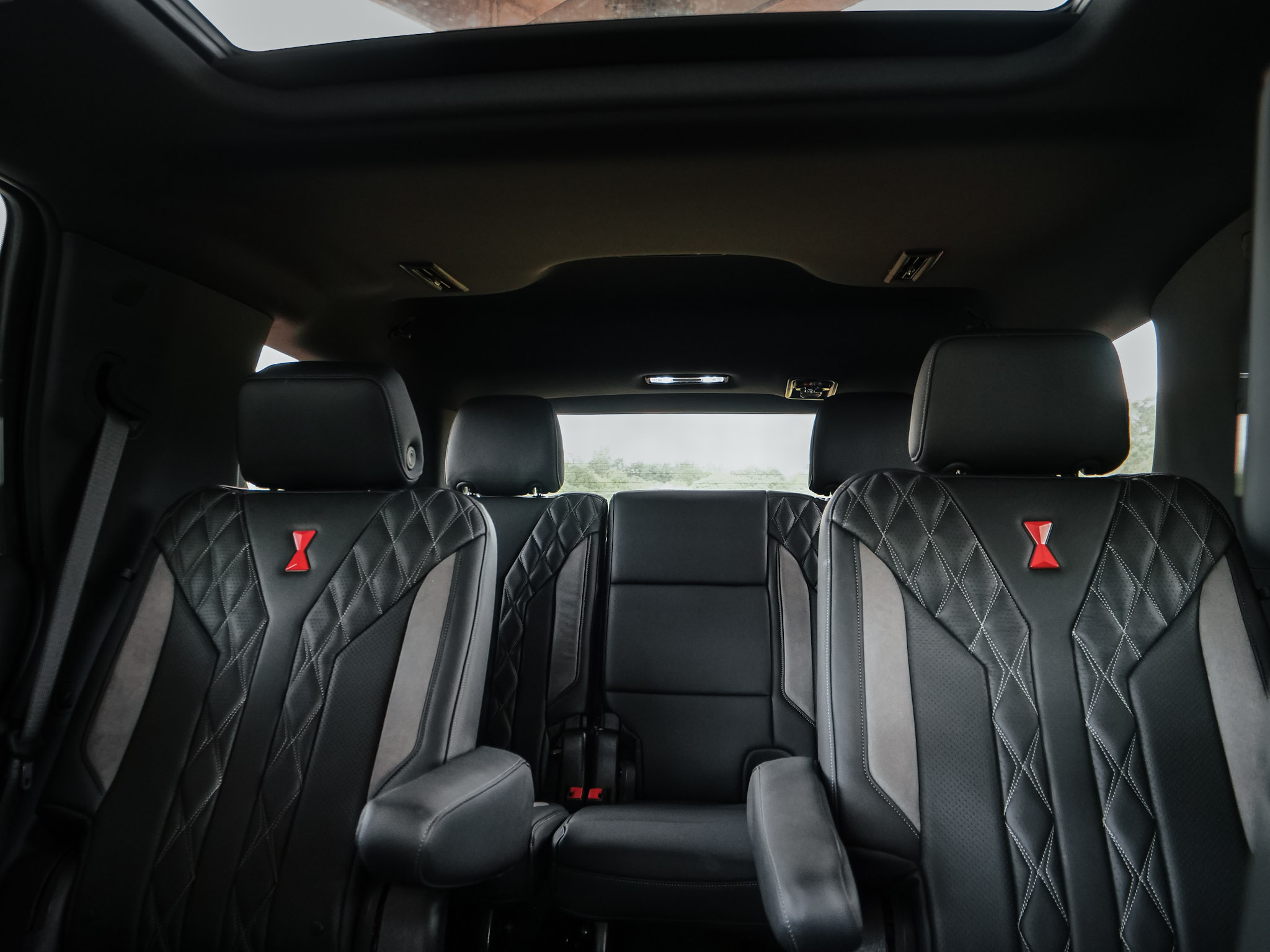 Chevy Silverado Black Widow interior with guy looking at his horse.