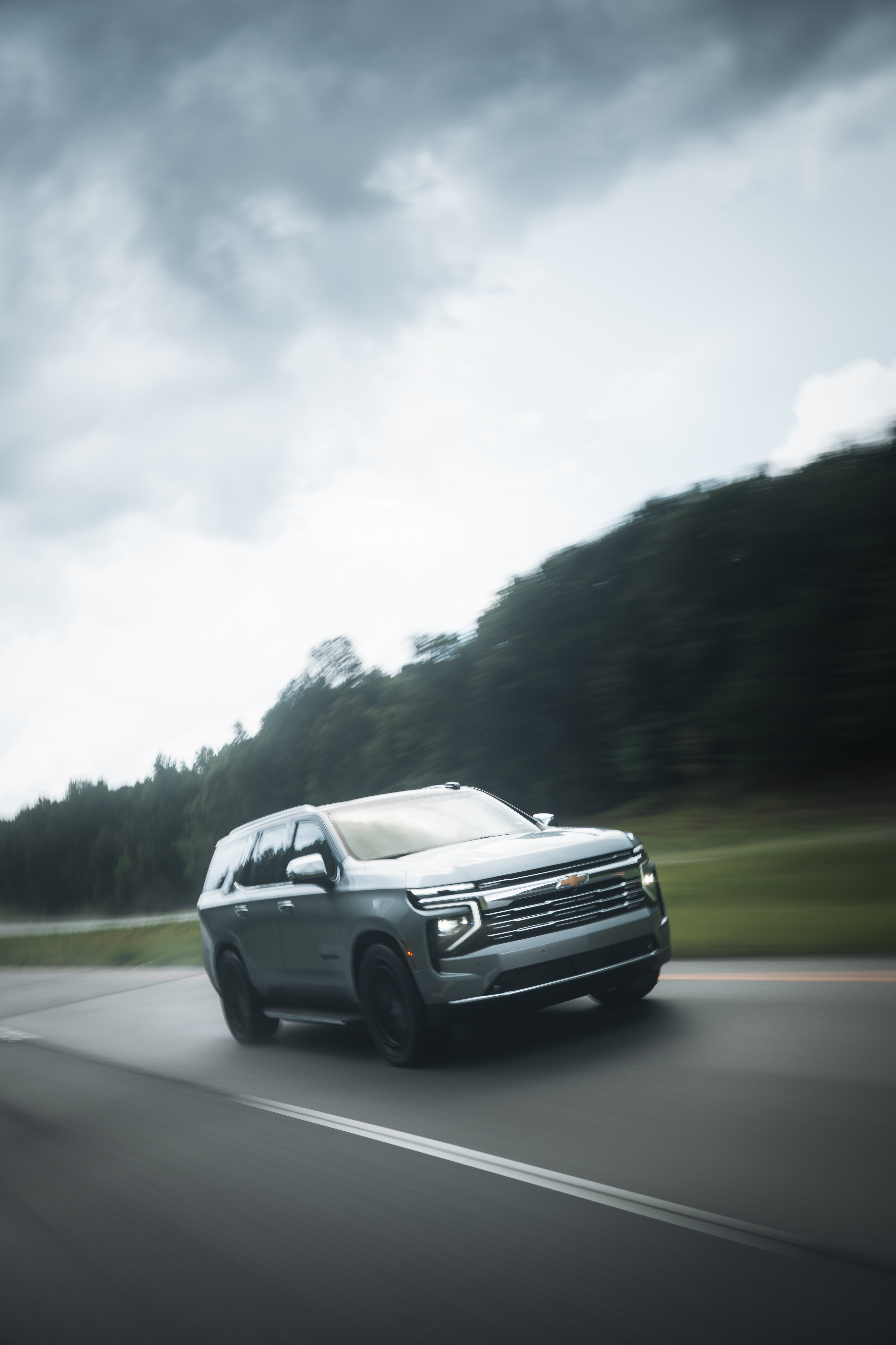 lowered black widow chevy tahoe on fox factory vehicles