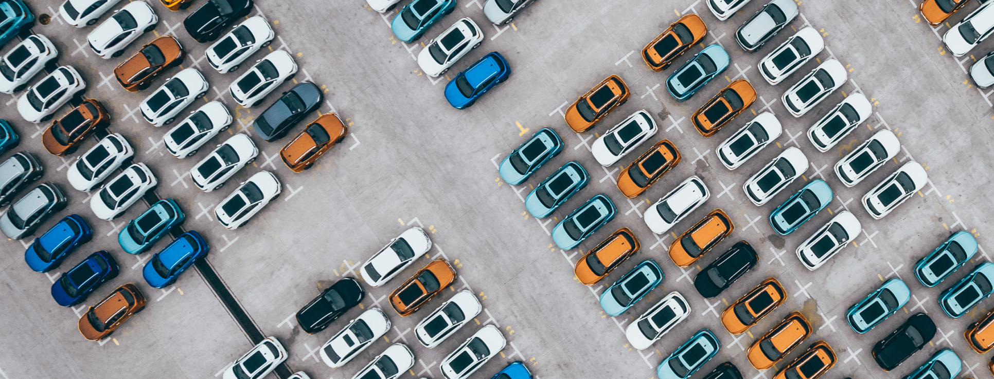 A woman is looking at a tablet computer.