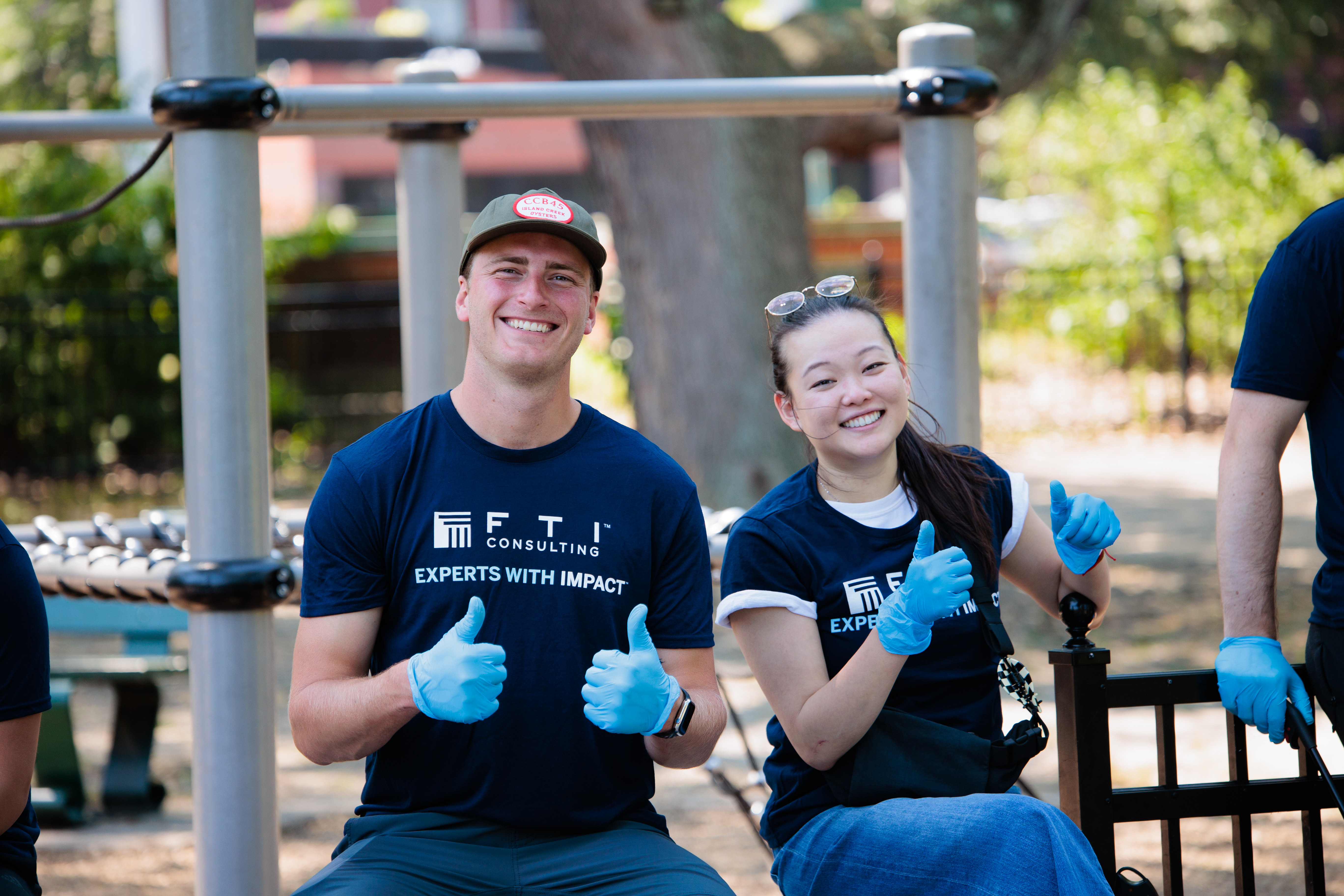 Image of a group of people sitting around a table.	