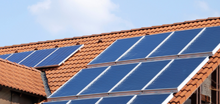 Solar Power Plant in modern city in sunset,Sustainable Renewable Energy