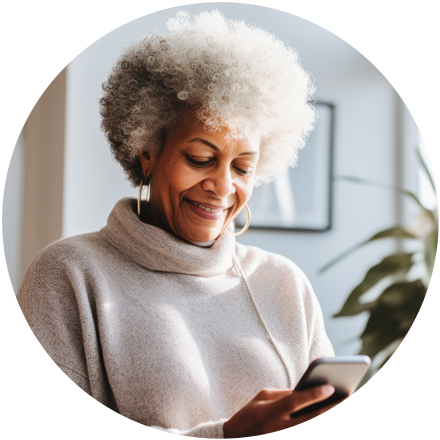 Woman smiling and holding smartphone