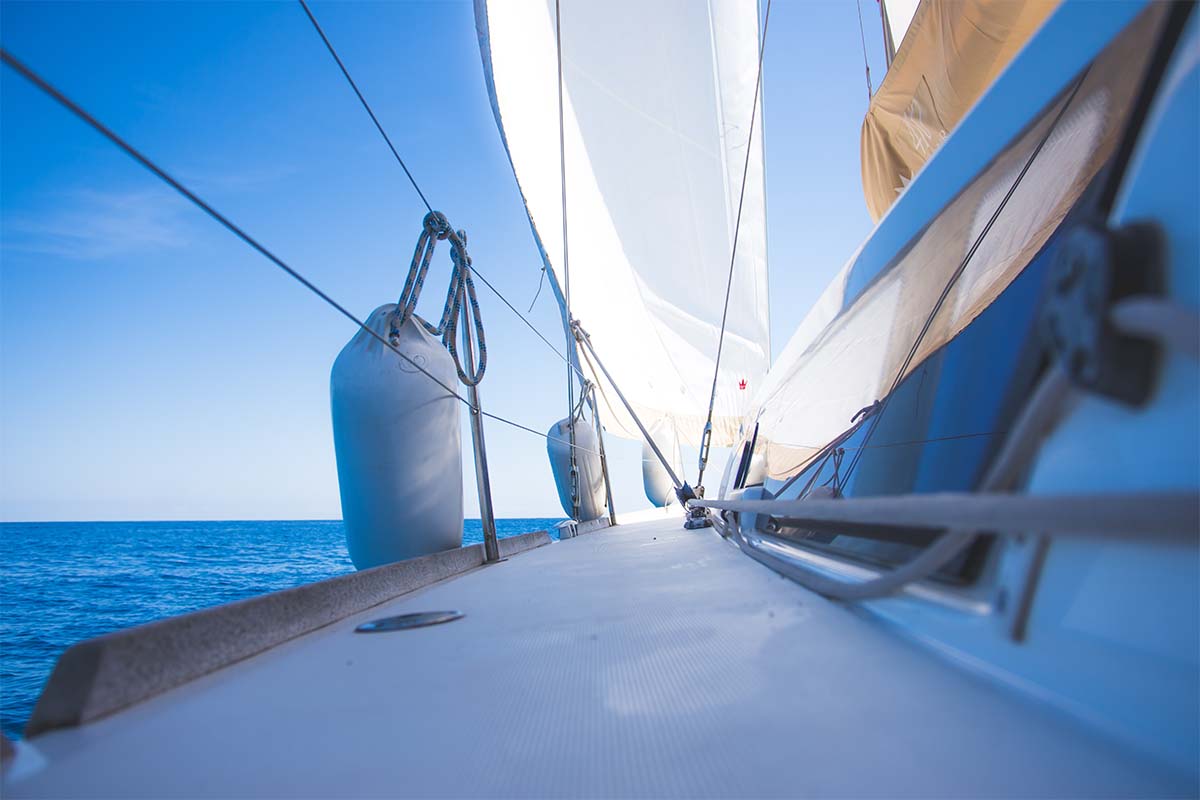blue background of upclose floor of sailboat at sea