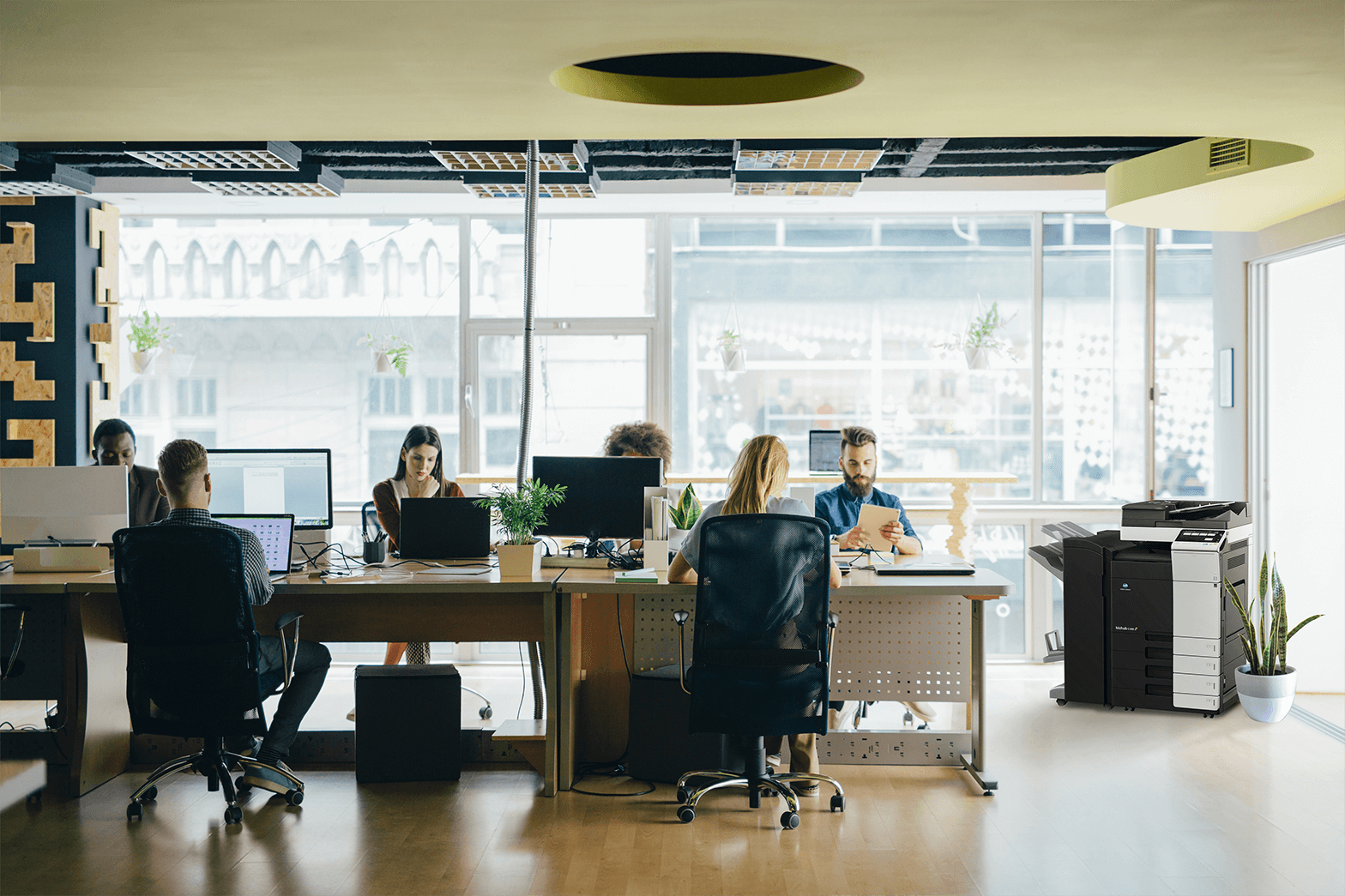 A table full of workers at an open office
