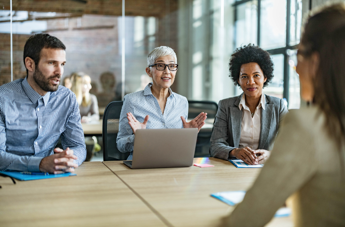 3 business people consulting with someone