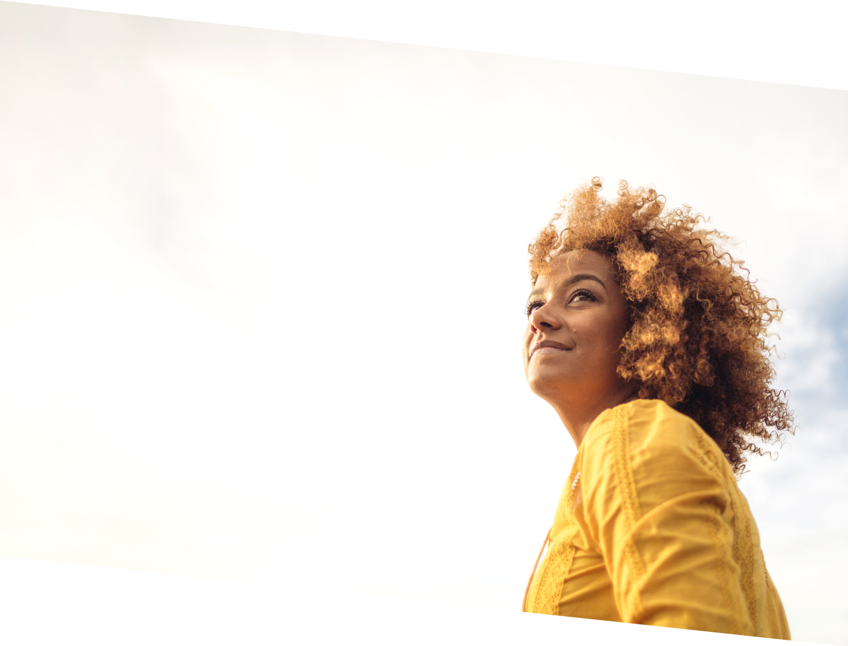 Image of a person looking up into the sky