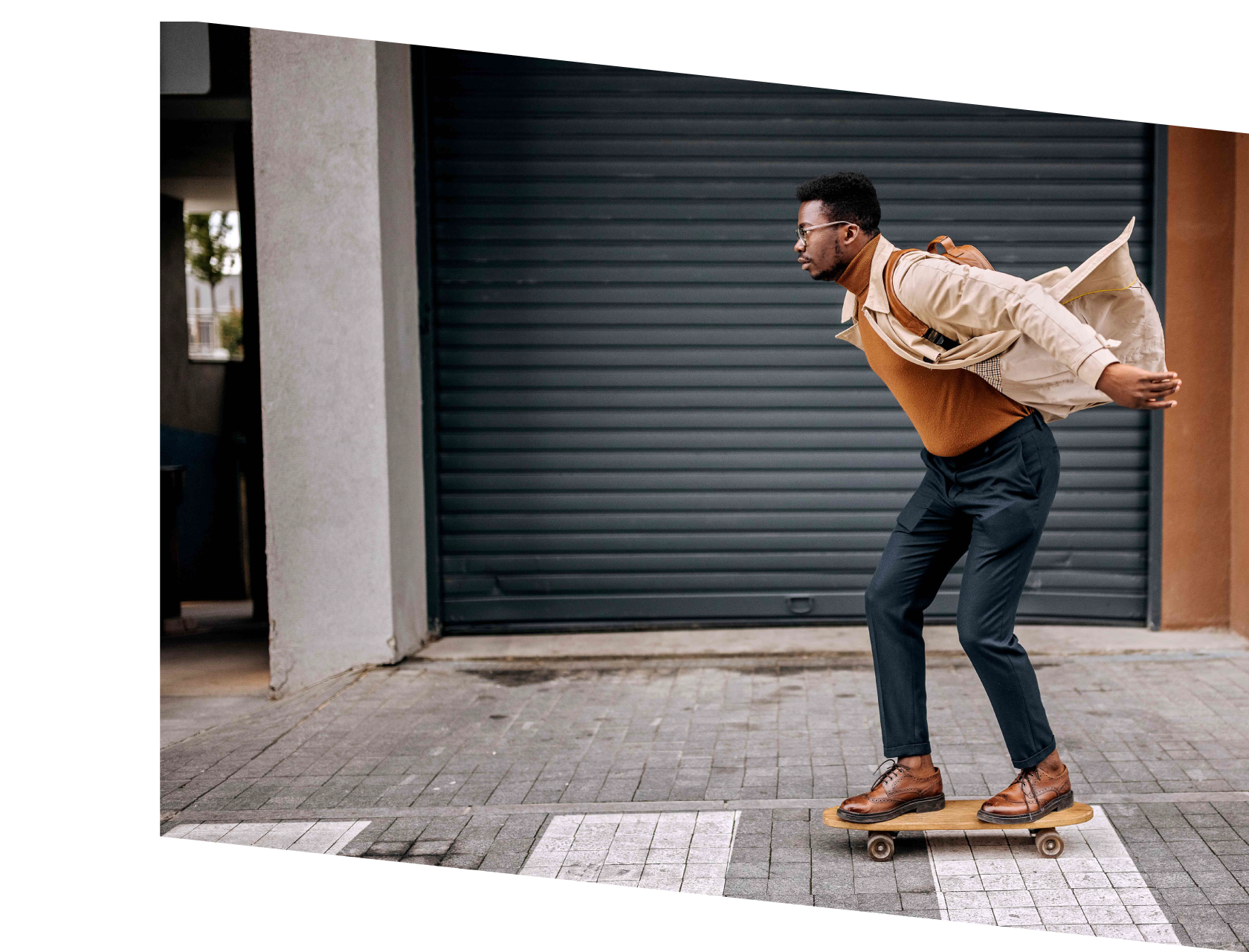 Image of a business person skateboarding