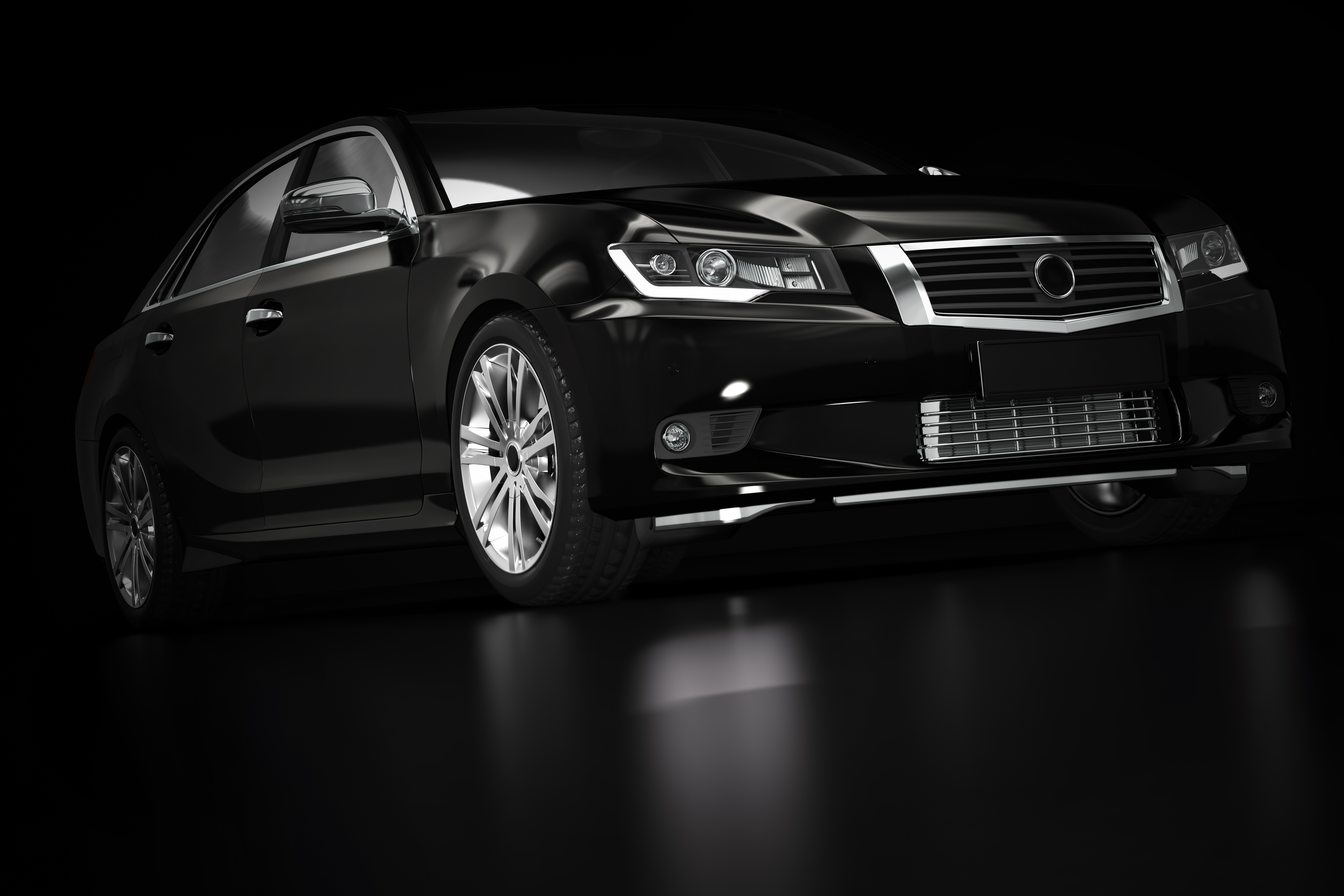Modern black metallic sedan car in spotlight. Generic desing, brandless. 3D rendering.