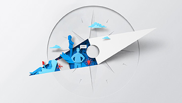 A white sheet of paper has been cut and folded, creating the silhouette of a compass. Inside of the compass needle are vibrant blue and red color shapes depicting various aspects of leadership and it’s innovative and collaborative nature with symbols of communication and ideas.