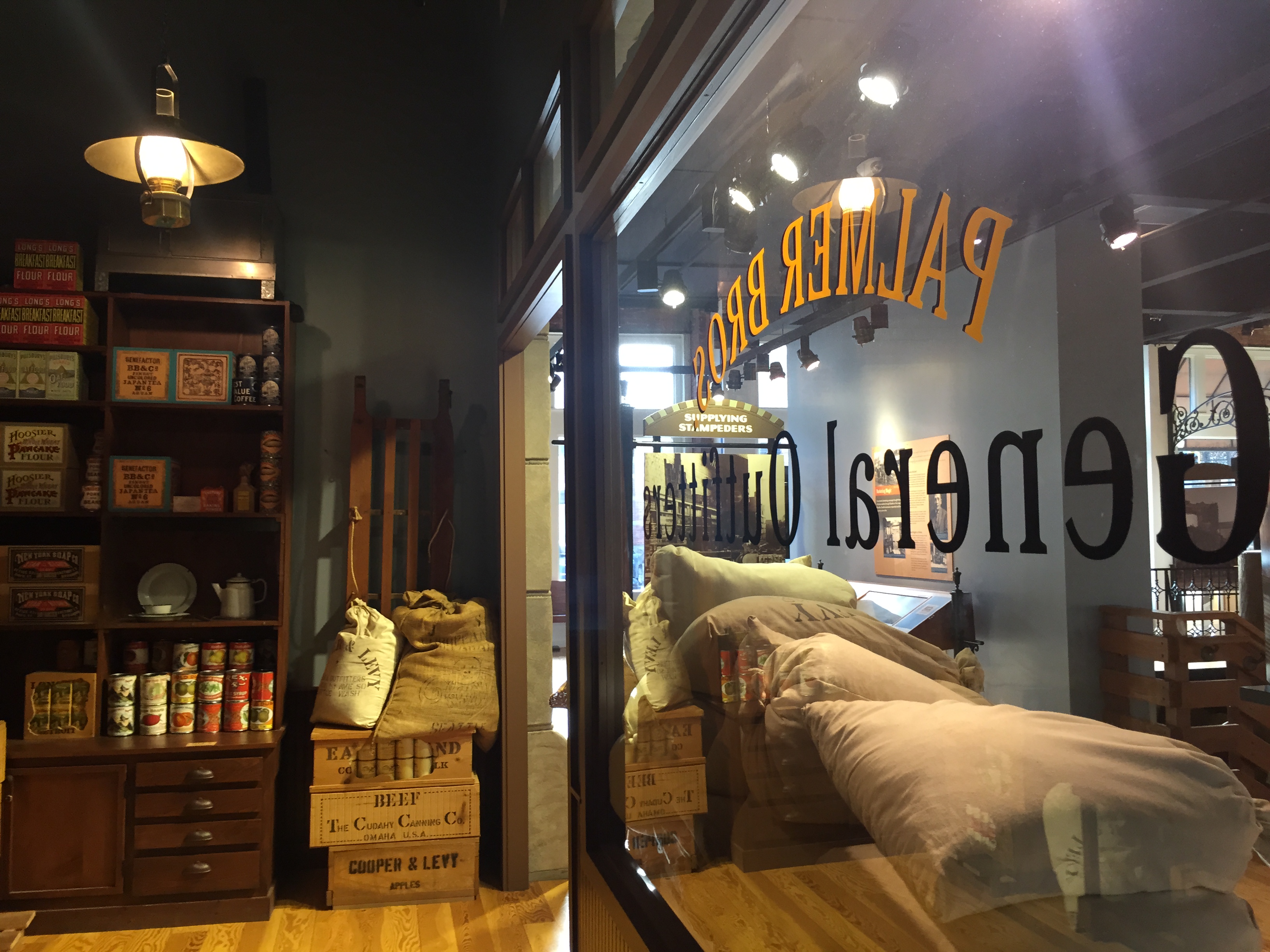 Shelves stocked with goods at a replica 1800's general store