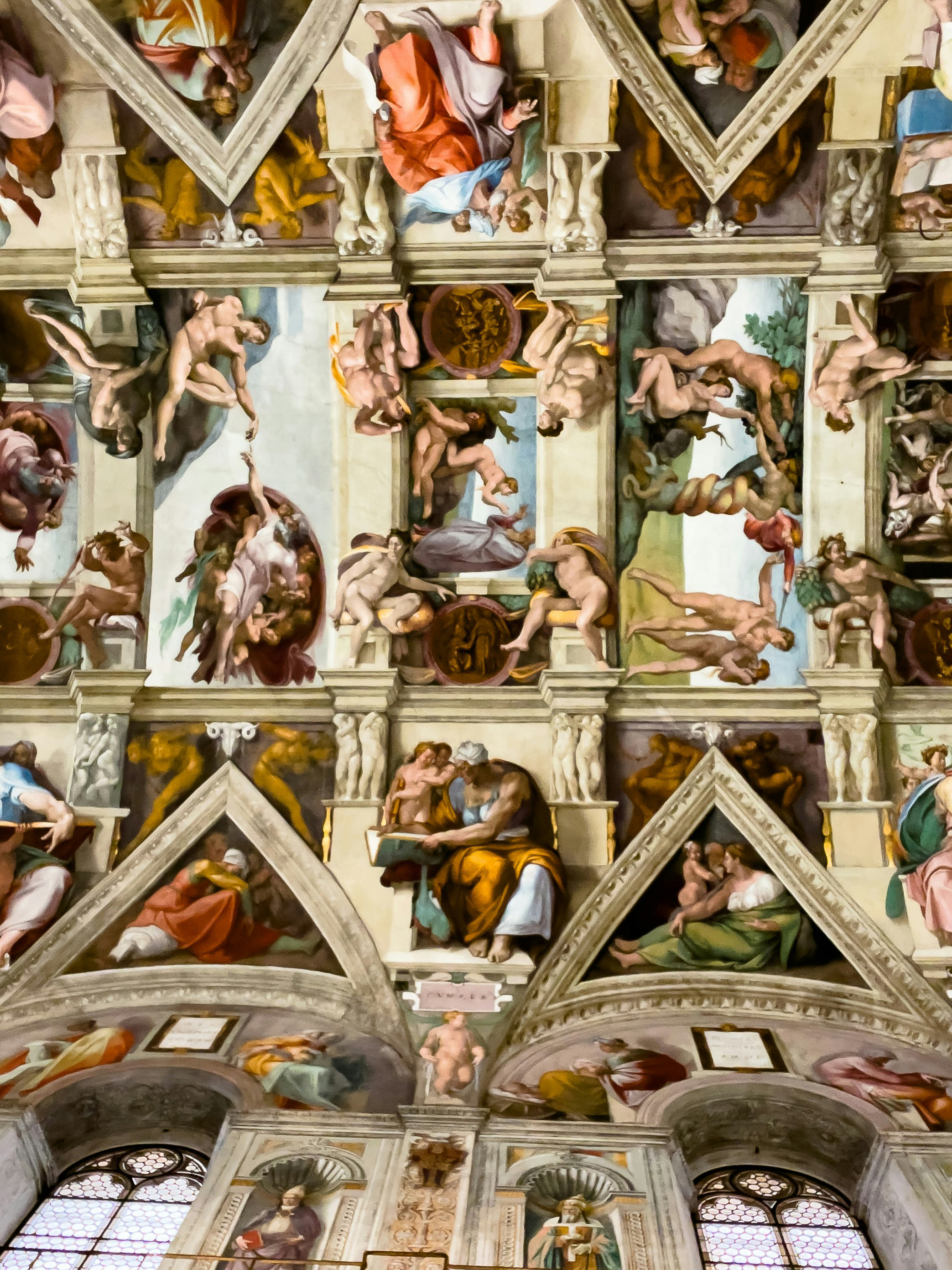 Detailed frescos on the ceiling of St. Peter's Basilica at the Vatican