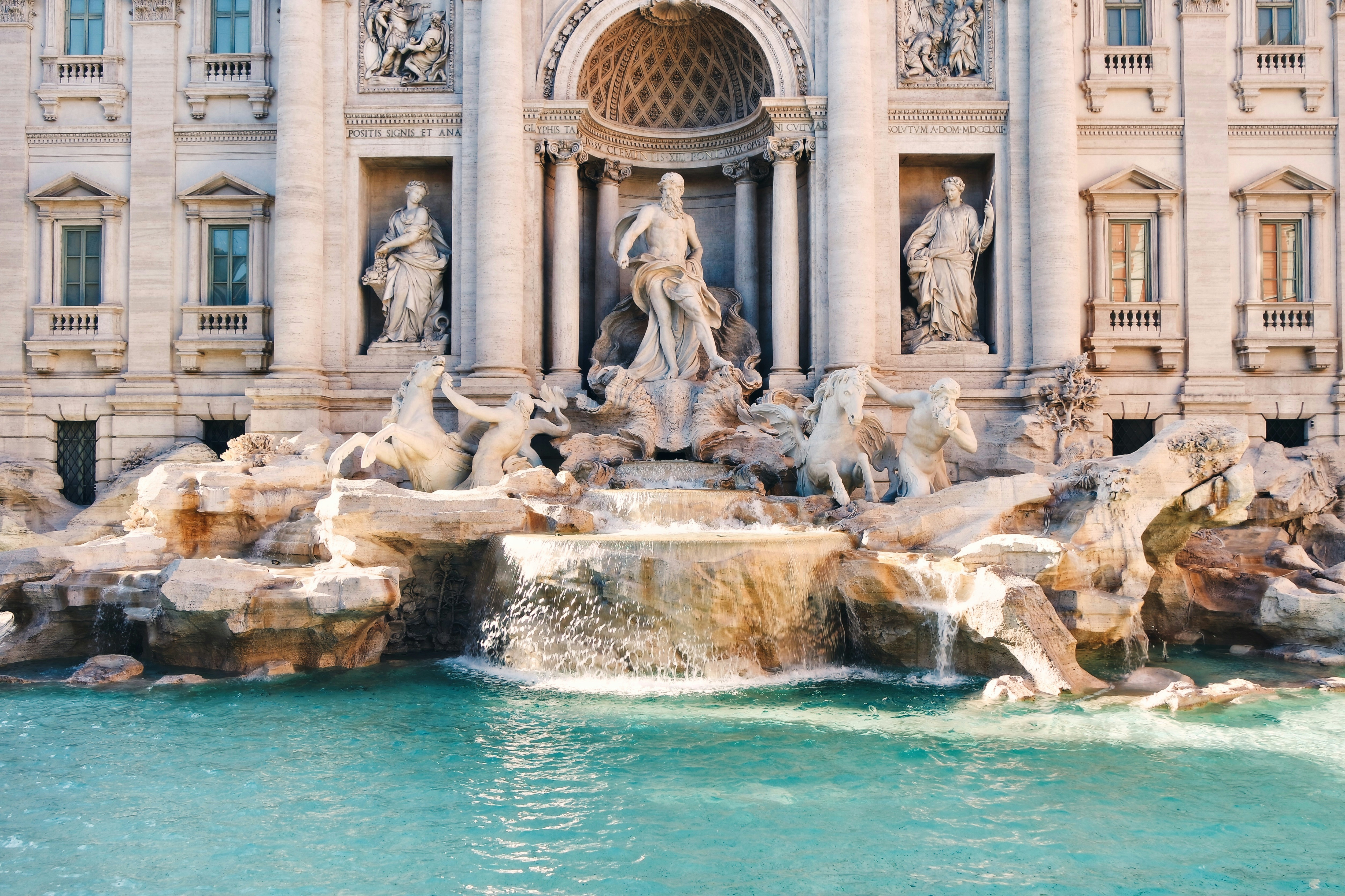 Trevi Fountain - statues on the front of a large fountain