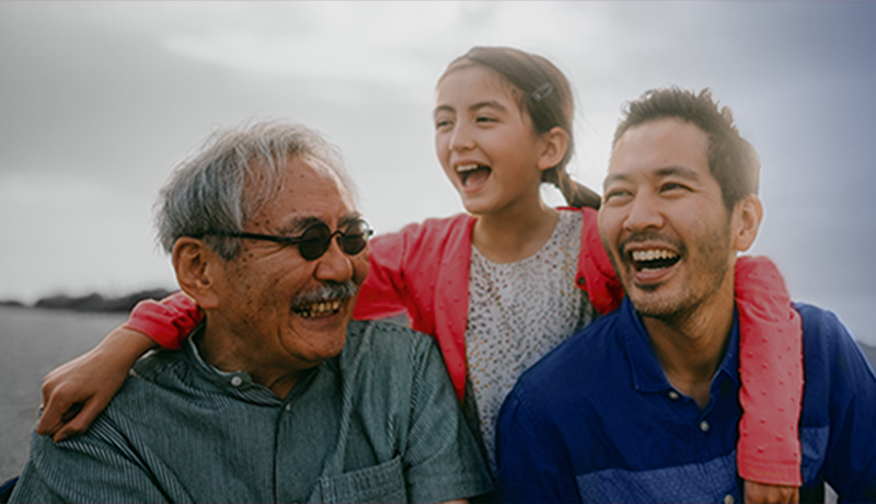 Image of a man with his son and granddaughter