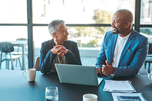 Image of a man and woman in a meeting